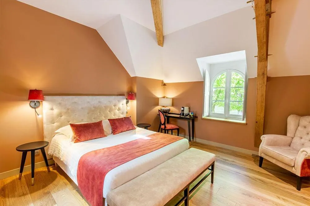 Photo of the whole room, Bed in Hotel Haras De La Potardiere