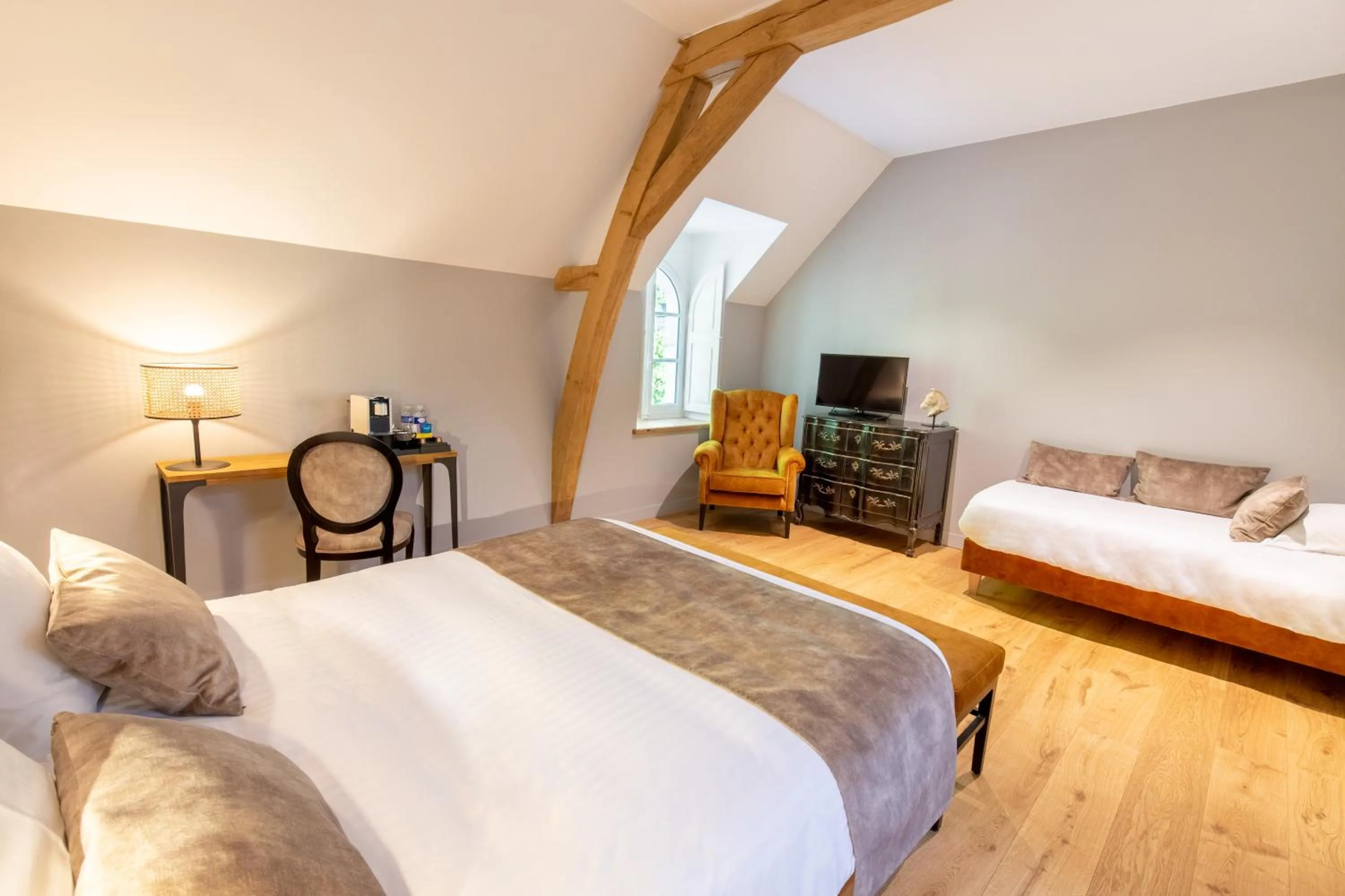 Bed in Hotel Haras De La Potardiere