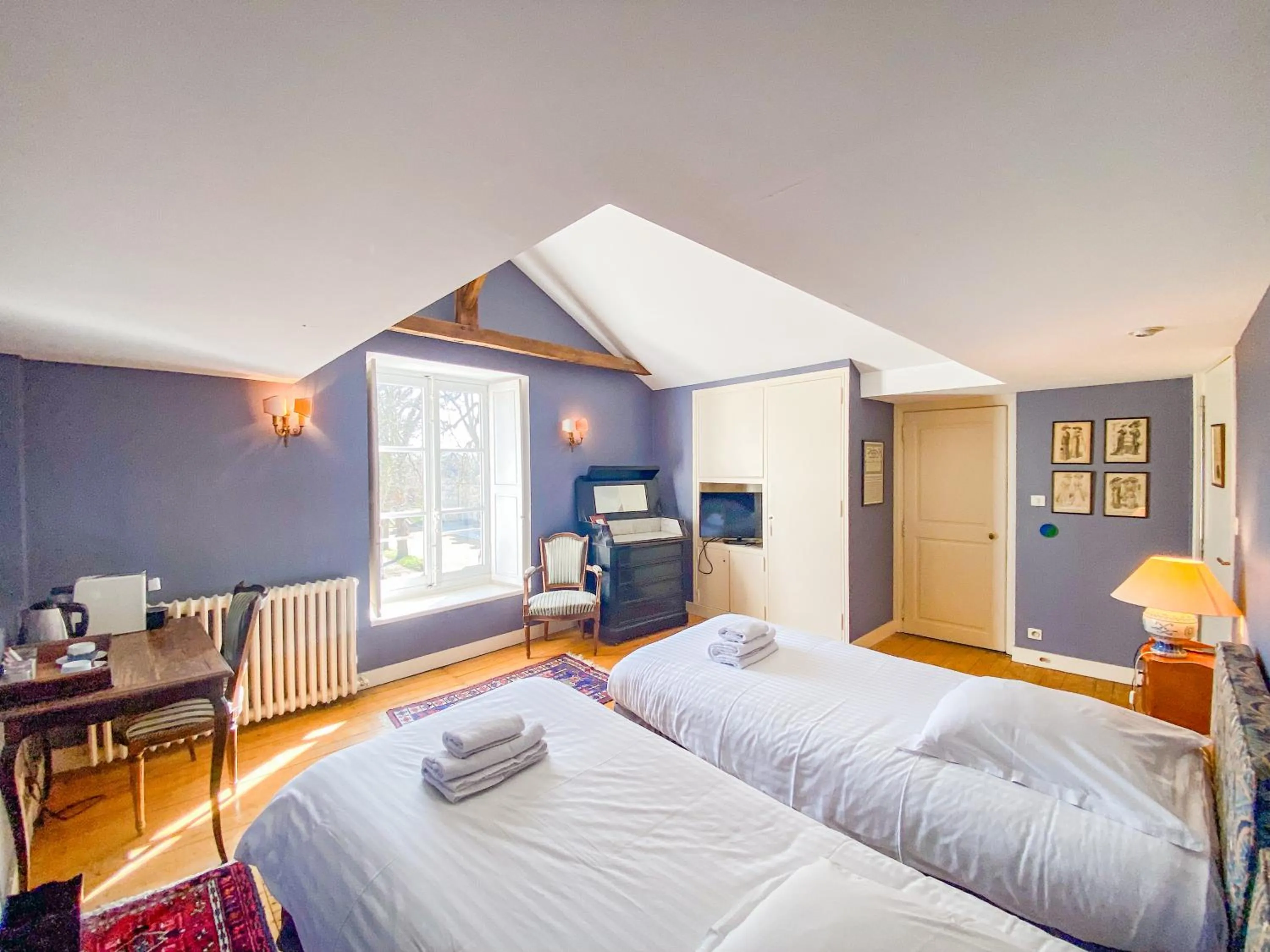 Bed in Hotel Haras De La Potardiere