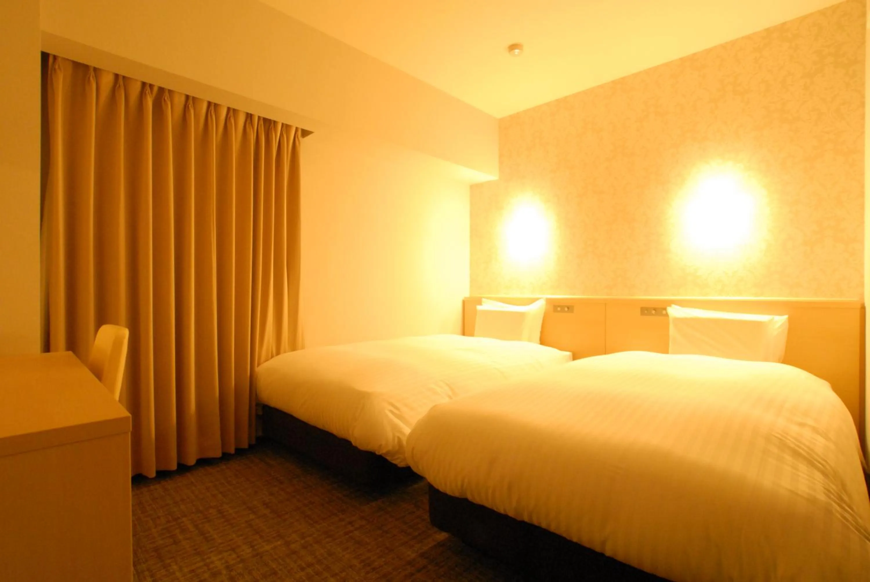 Bed in AB Hotel Fuji