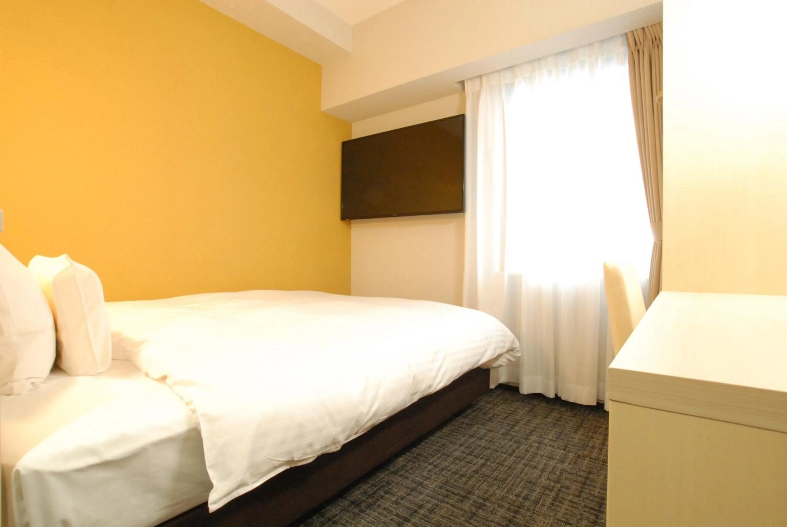 Bed in AB Hotel Fuji