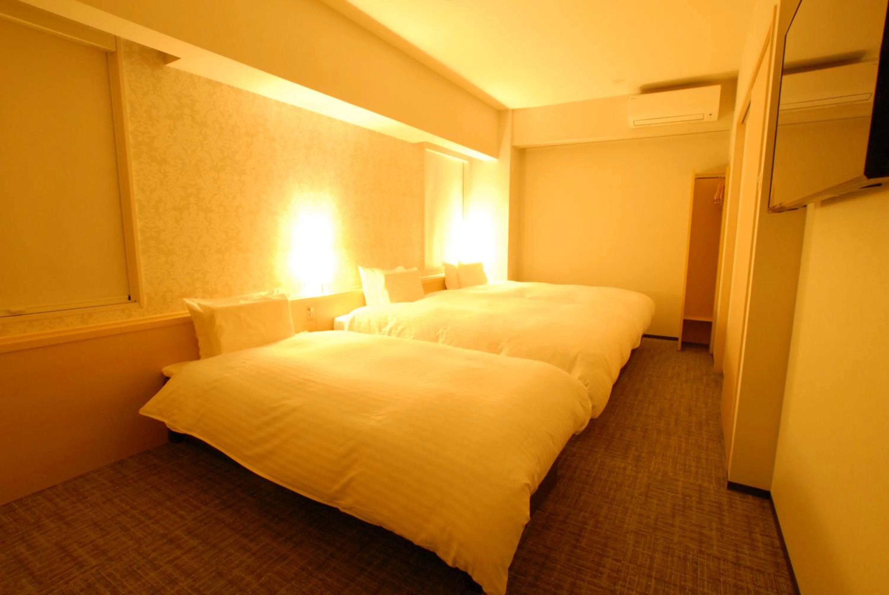 Bed in AB Hotel Fuji