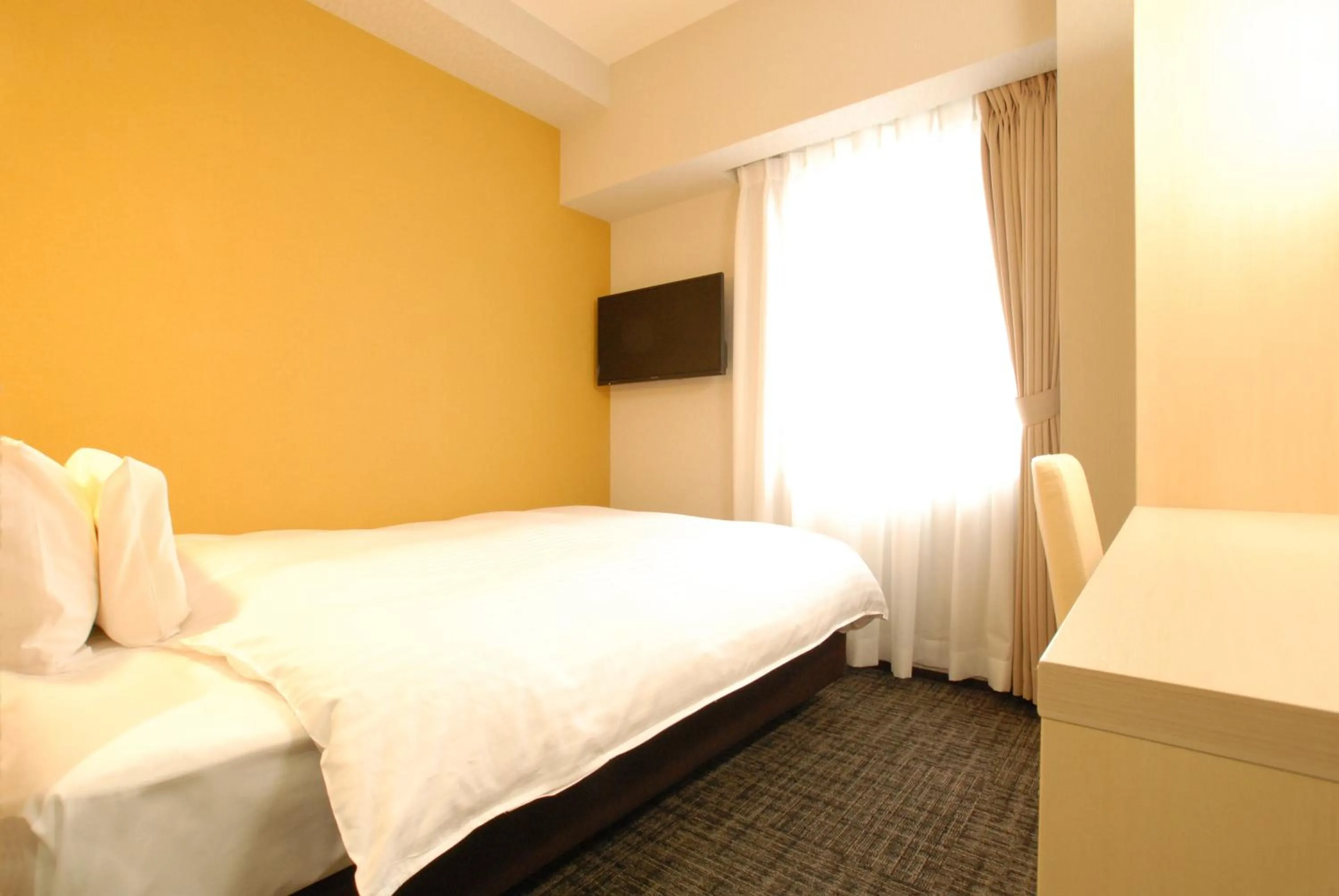 Bed in AB Hotel Fuji