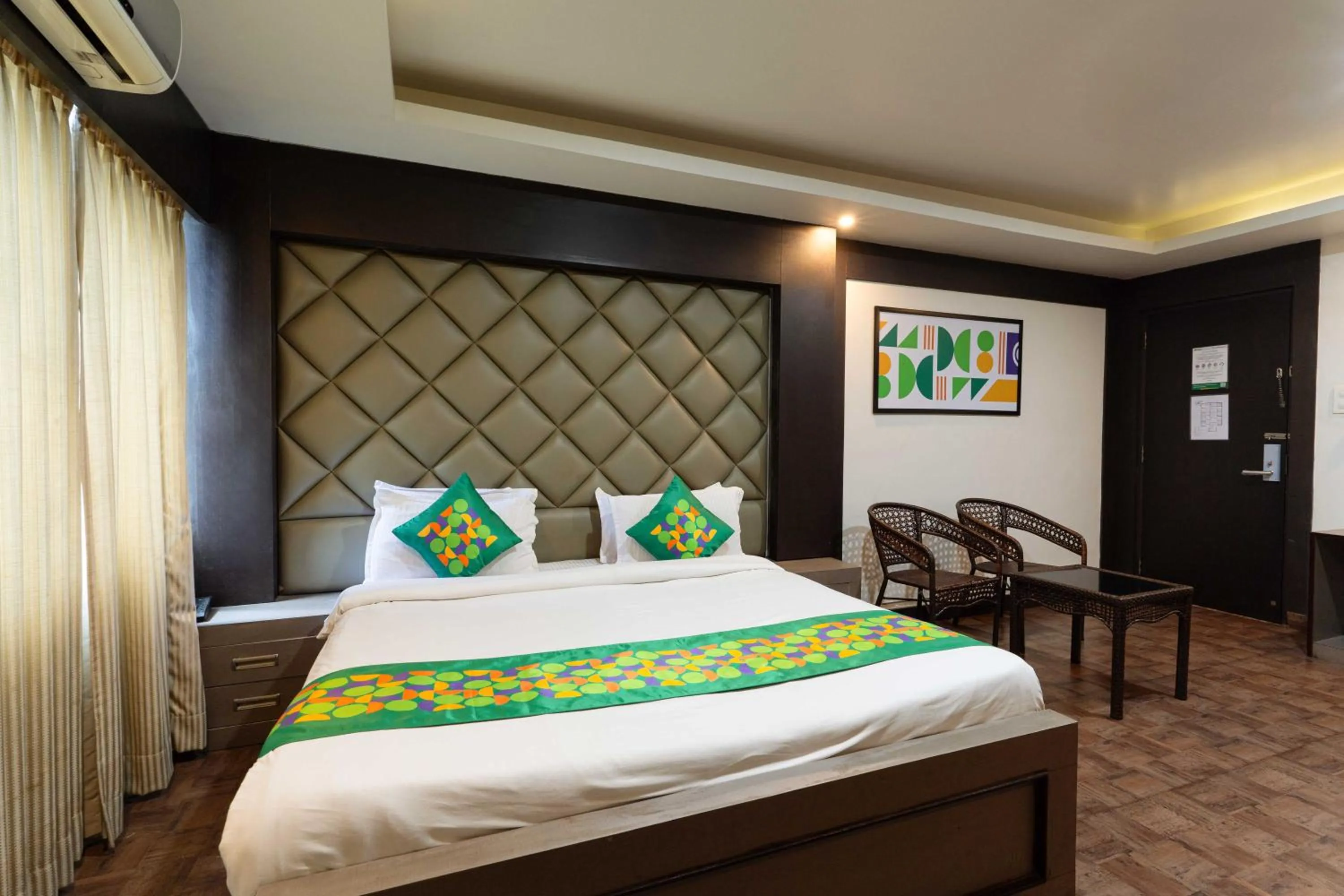 Bedroom, Bed in Treebo Kings Orchid