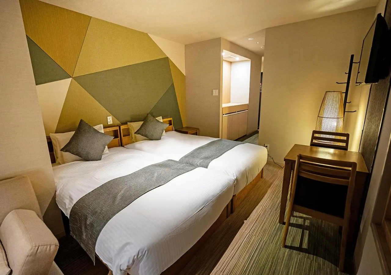 Bed in Stay SAKURA Tokyo Asakusa Yokozuna Hotel