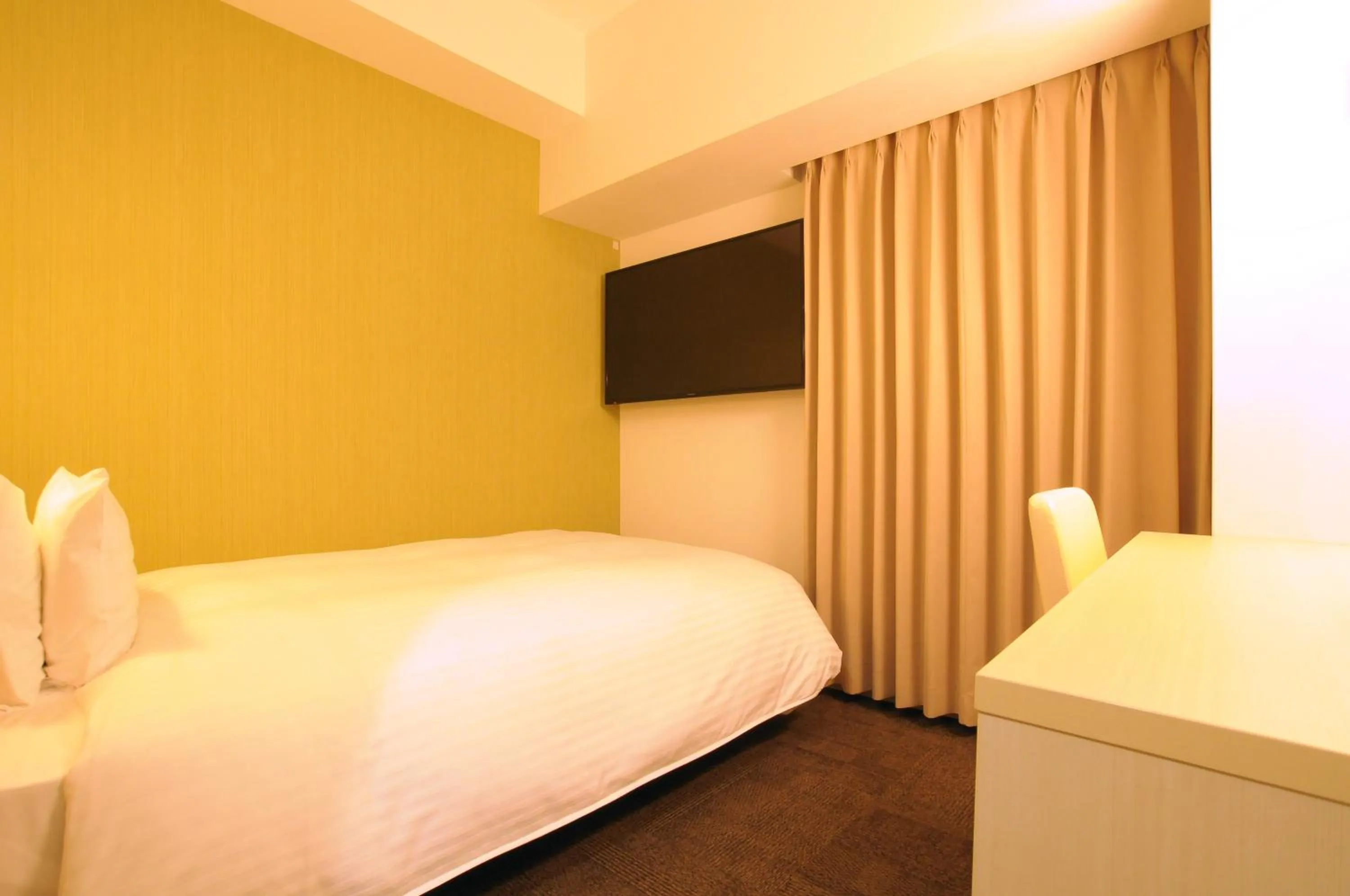 Bed in AB Hotel Tokai Otagawa