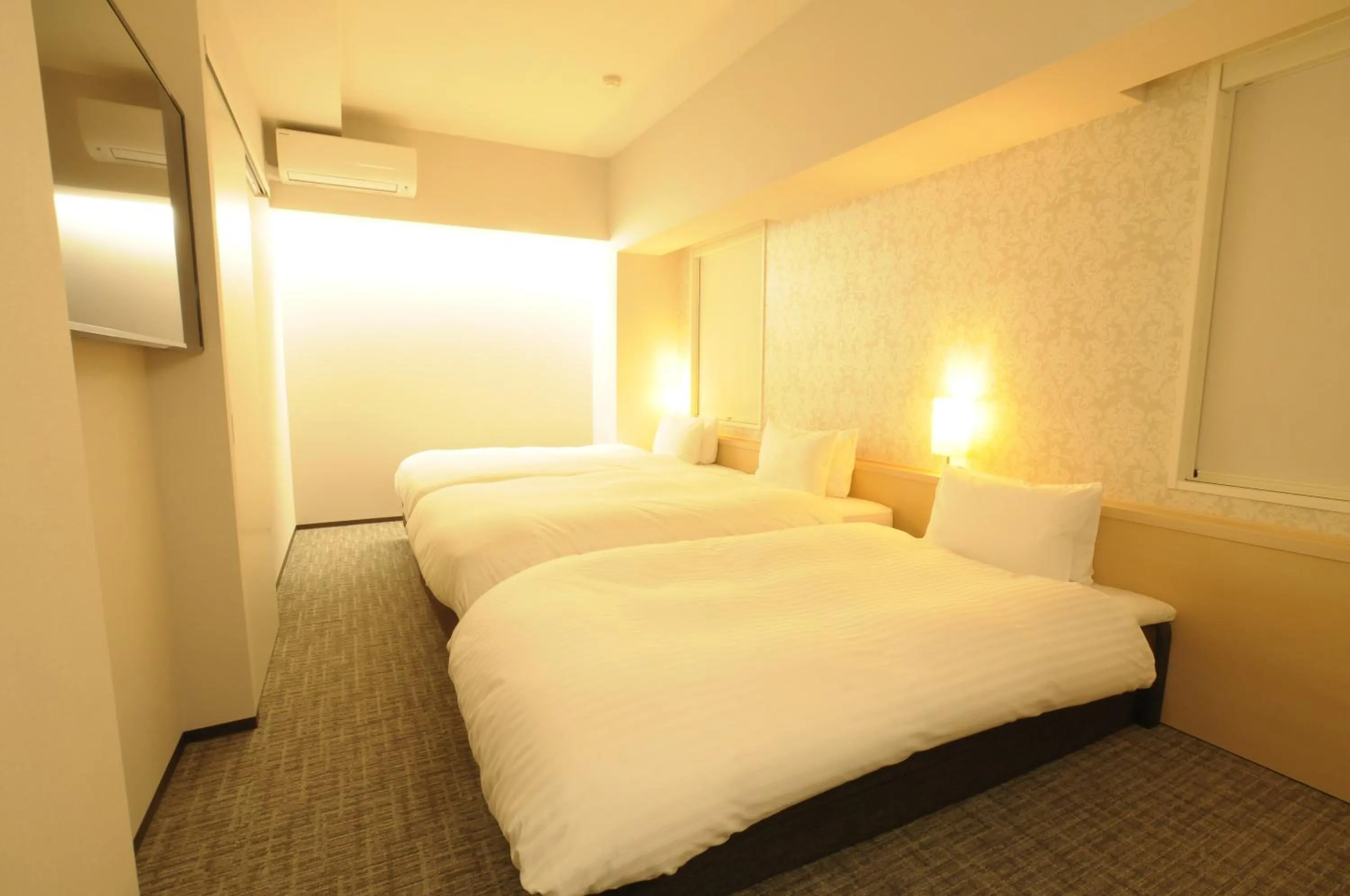 Bed in AB Hotel Omihachiman