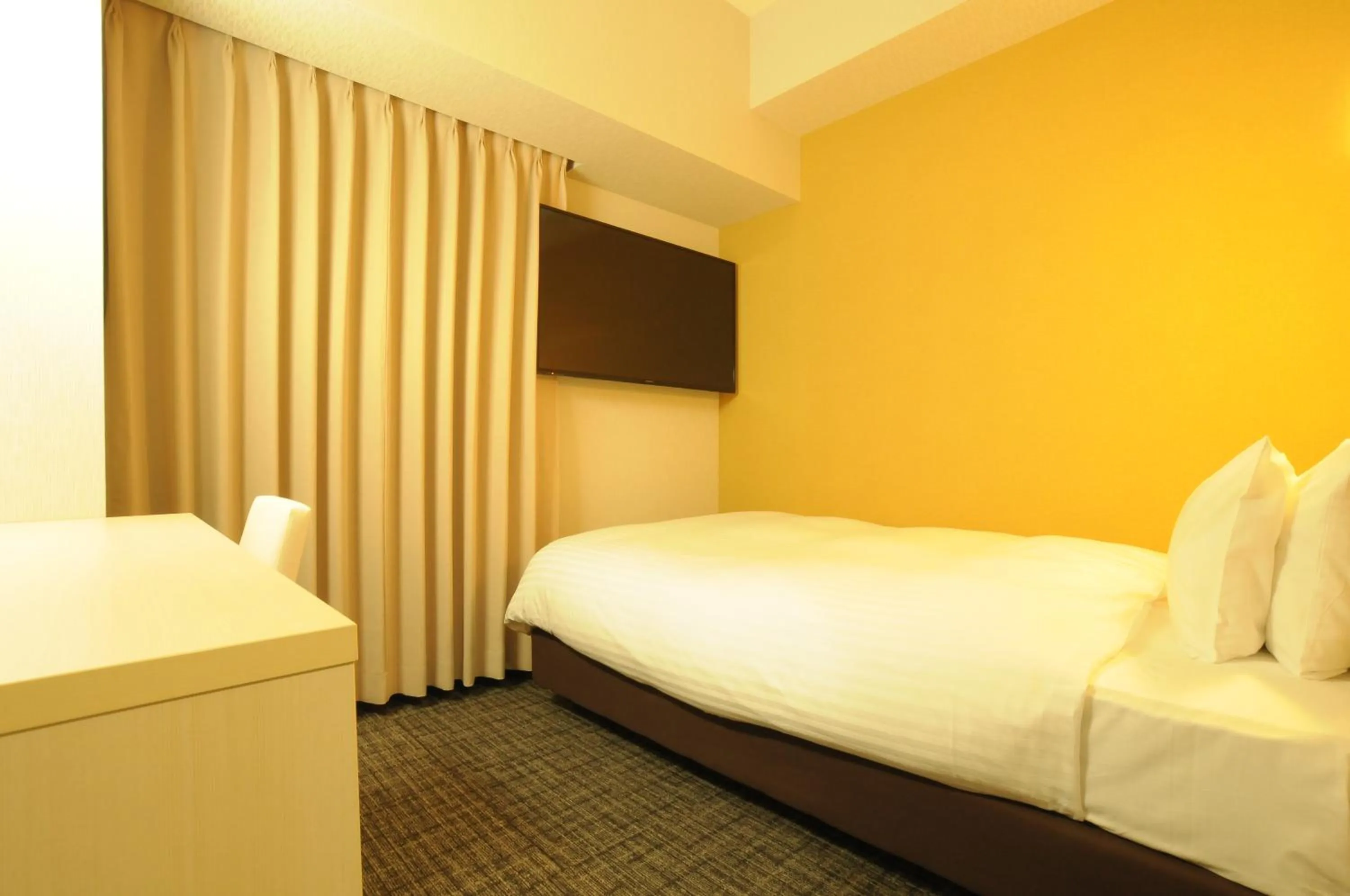 Bed in AB Hotel Omihachiman