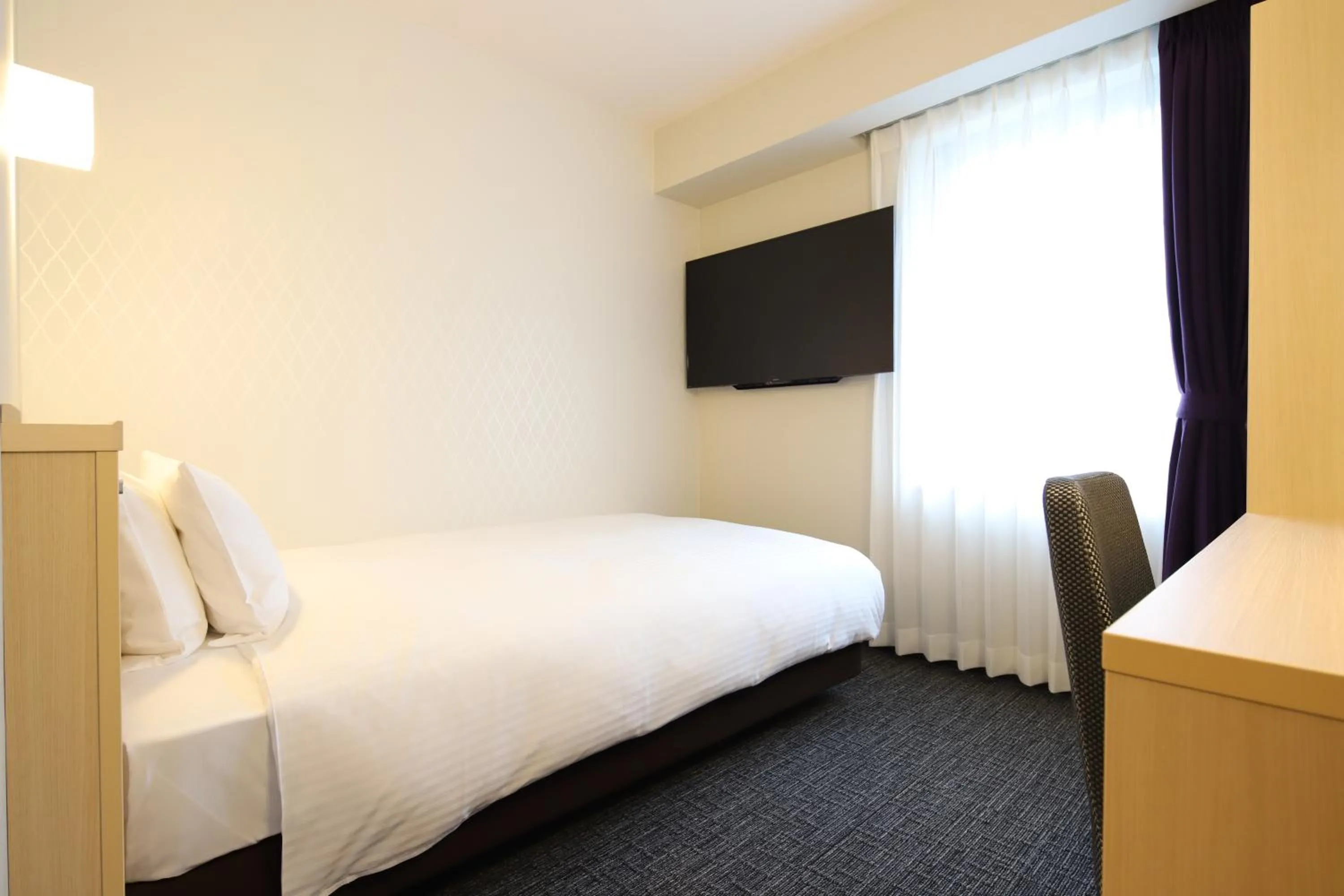 Bed in AB Hotel Osaka Sakaisuji Hommachi