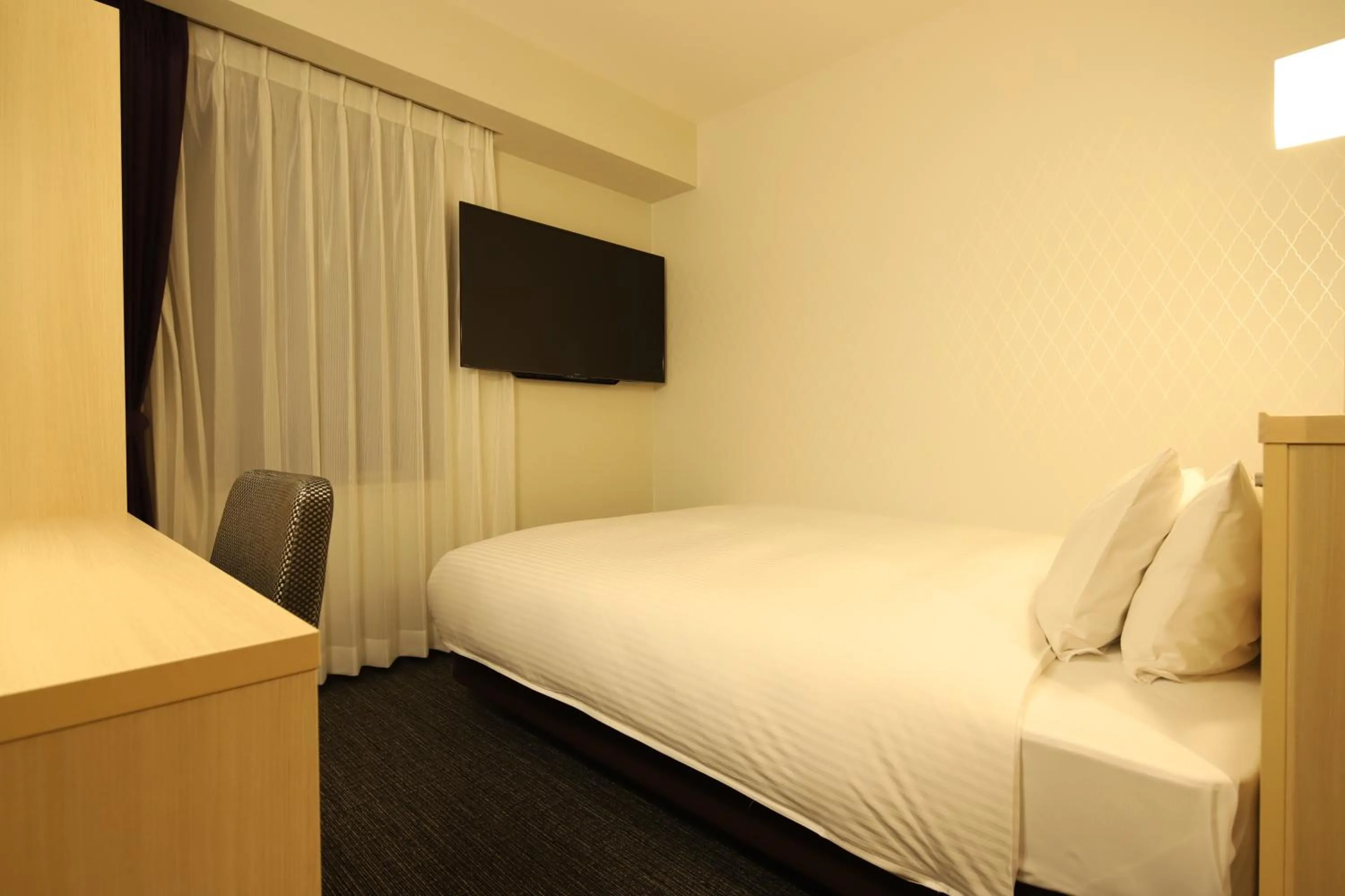 Bed in AB Hotel Osaka Sakaisuji Hommachi