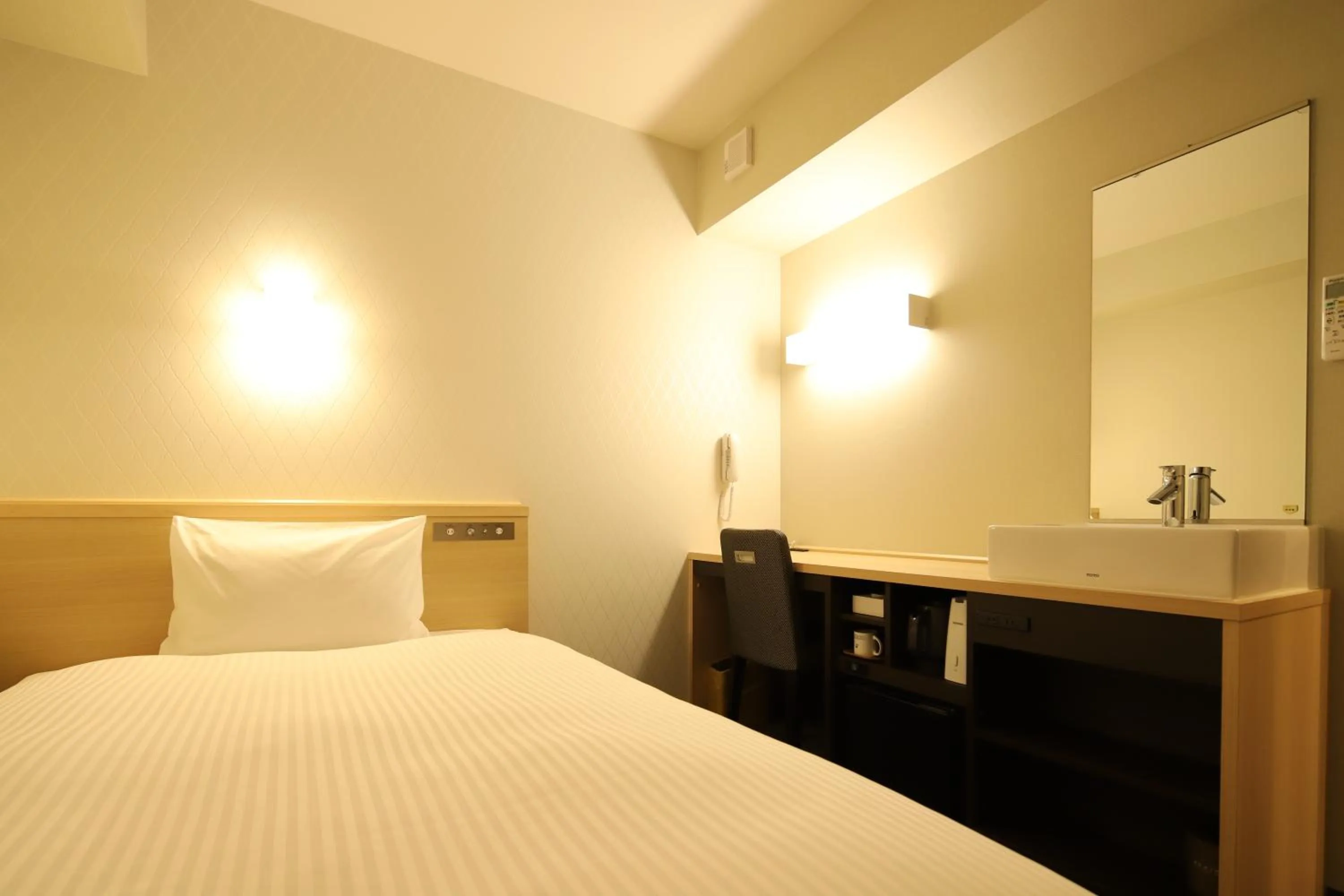 Bed in AB Hotel Osaka Sakaisuji Hommachi