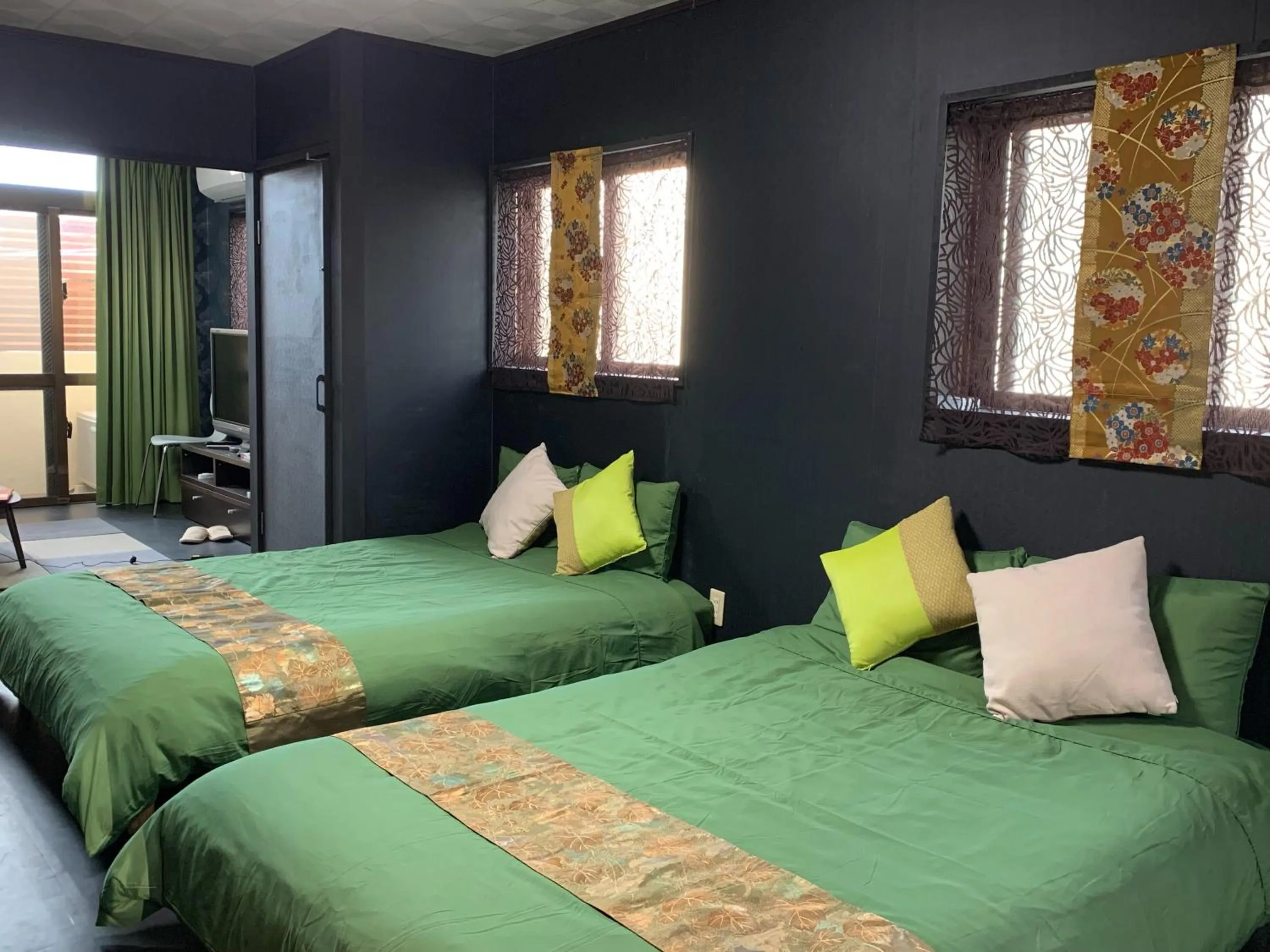 Bedroom, Bed in Maximum of 21 people can be rented in one building 3 minutes walk to Tomari Port 10 minutes drive to the airport No parking lot 30 seconds walk from paid parking lot warayunso port city May