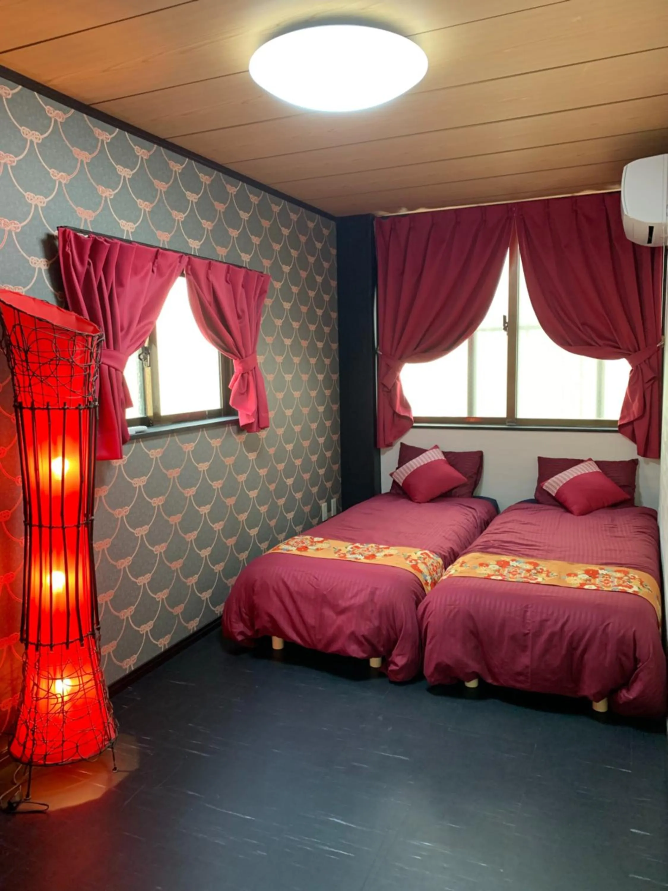 Bedroom, Bed in Maximum of 21 people can be rented in one building 3 minutes walk to Tomari Port 10 minutes drive to the airport No parking lot 30 seconds walk from paid parking lot warayunso port city May