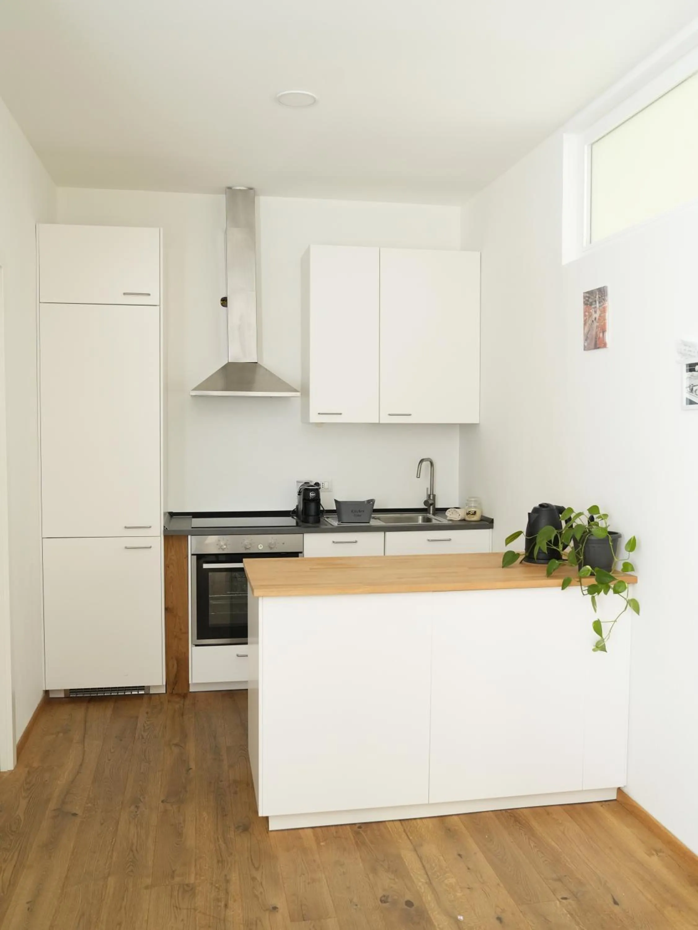 Kitchen or kitchenette in Albergo Caffe Centrale