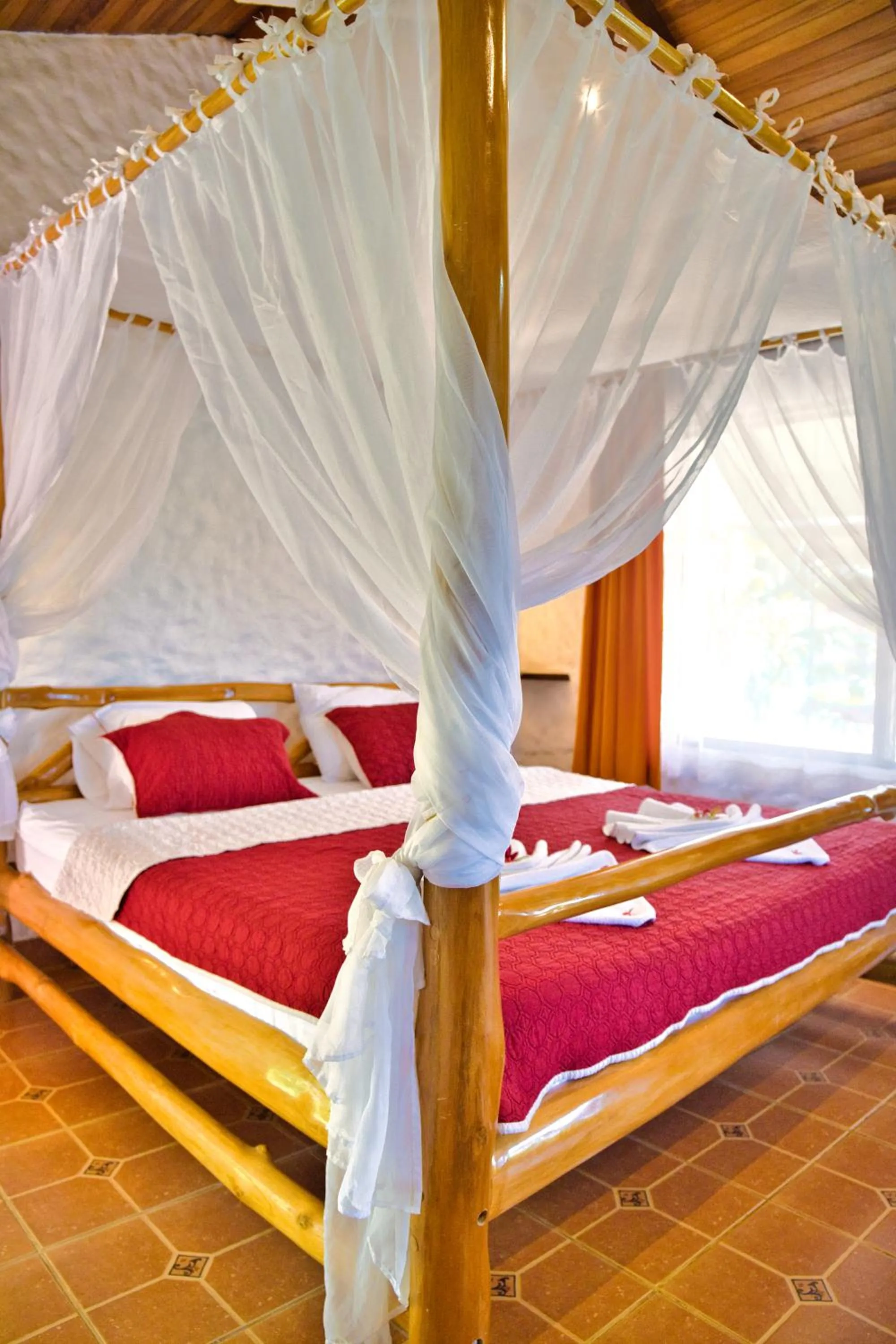 Bed in Samara Pacific Lodge