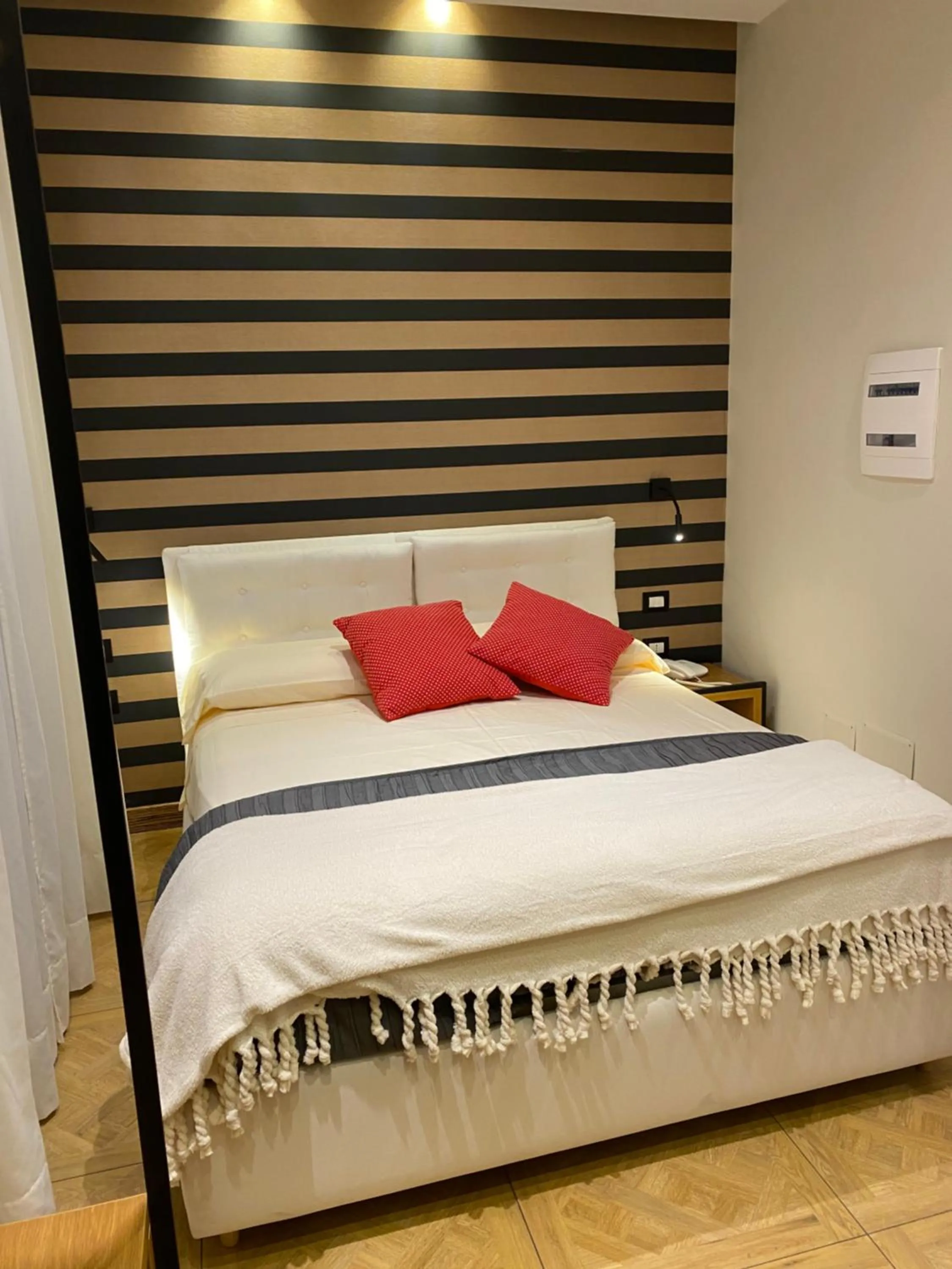 Bed in Kbirr Charming House