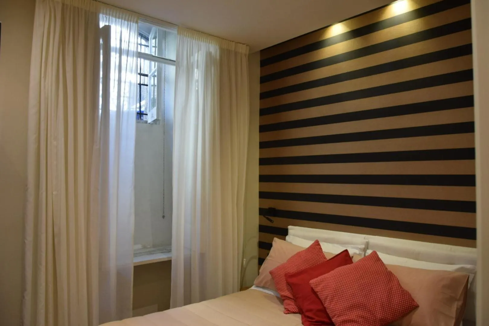 Bed in Kbirr Charming House