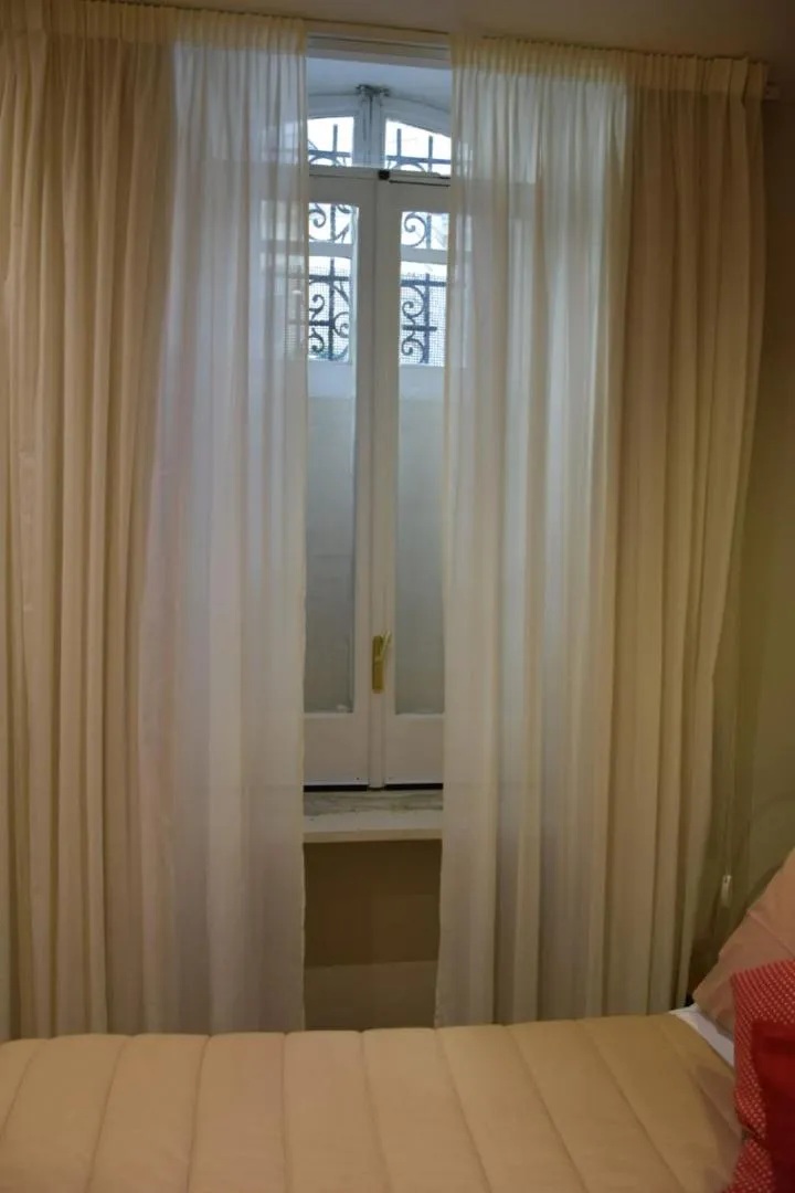 Bed in Kbirr Charming House