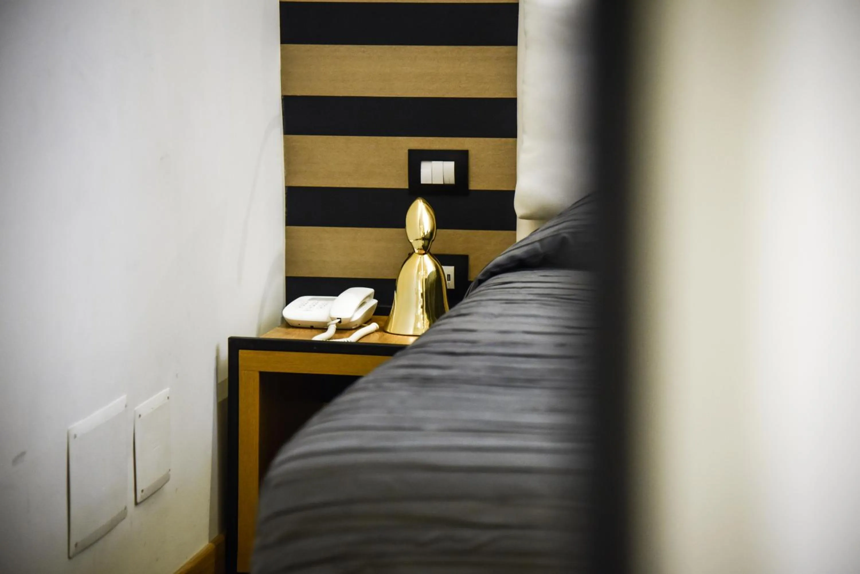 Bed in Kbirr Charming House