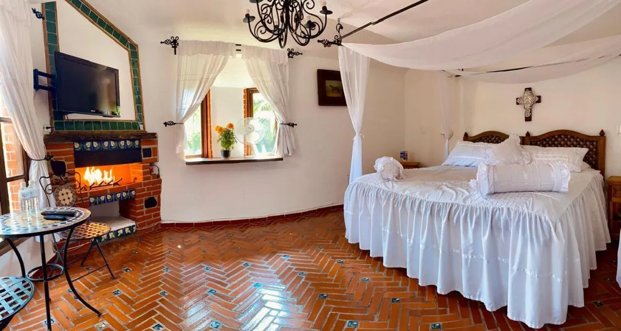 Photo of the whole room, Bed in Posada Los Alcatraces
