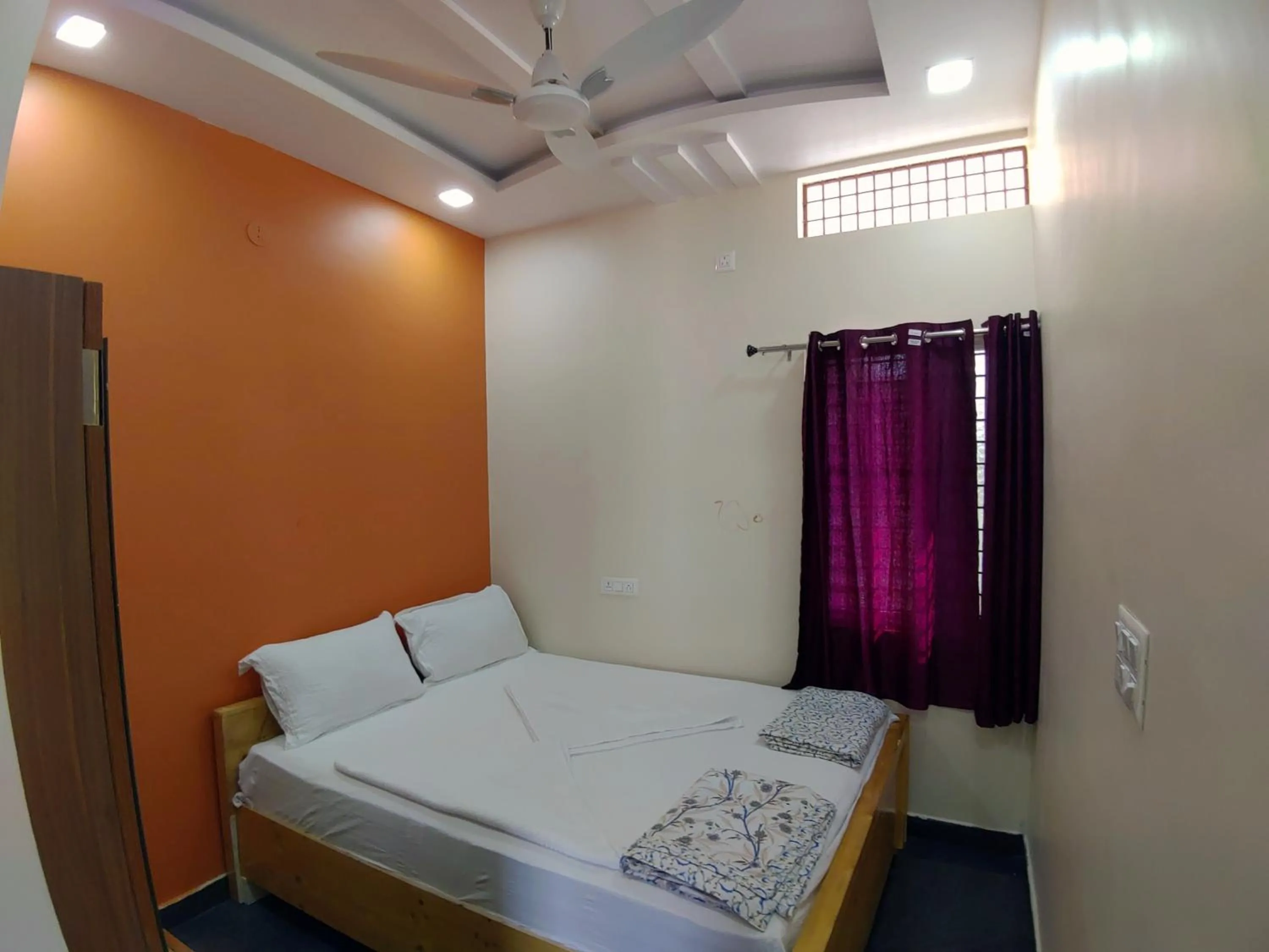 Bed in Hampi Two Bedroom Guesthouse