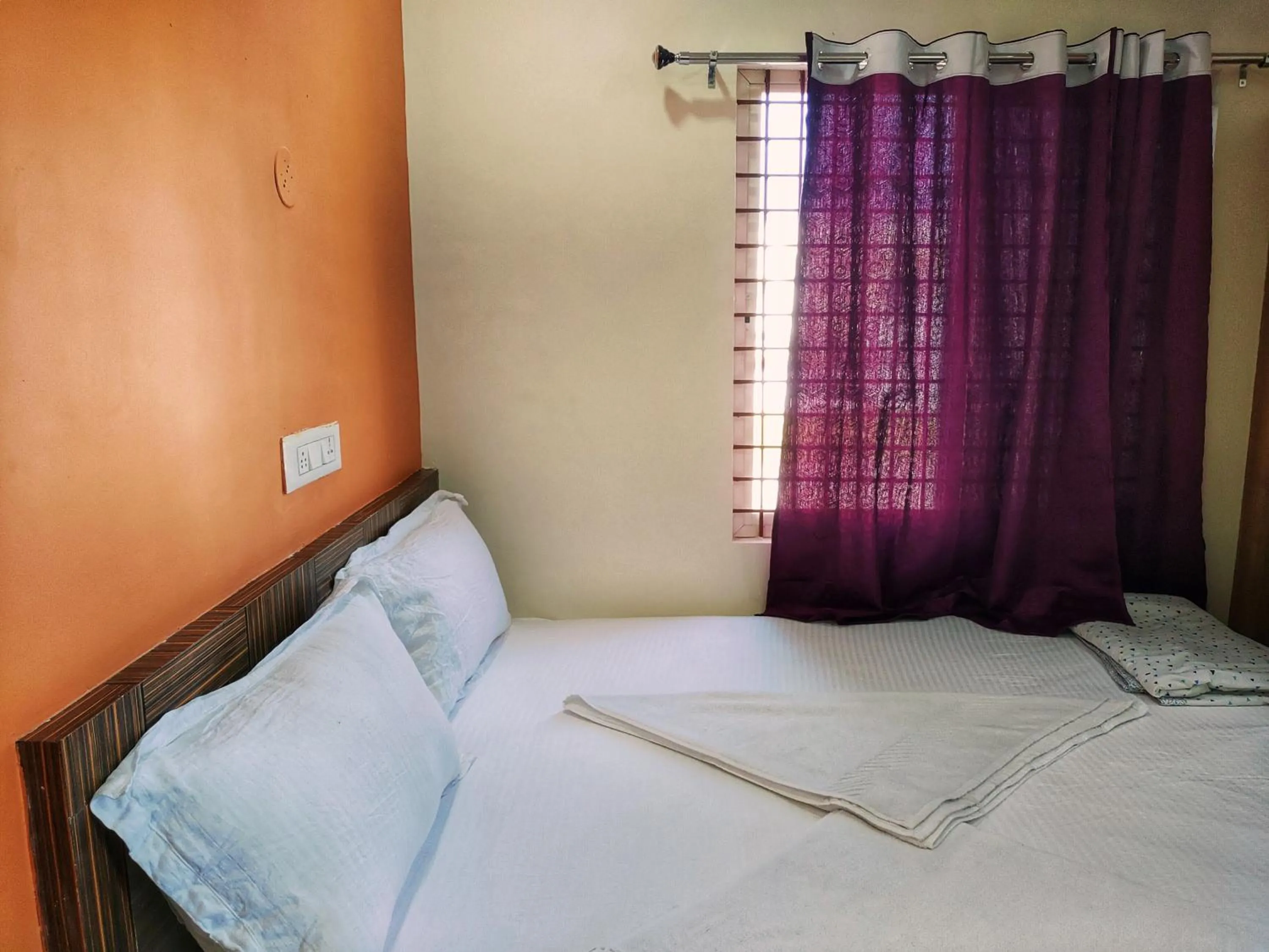 Bed in Hampi Two Bedroom Guesthouse