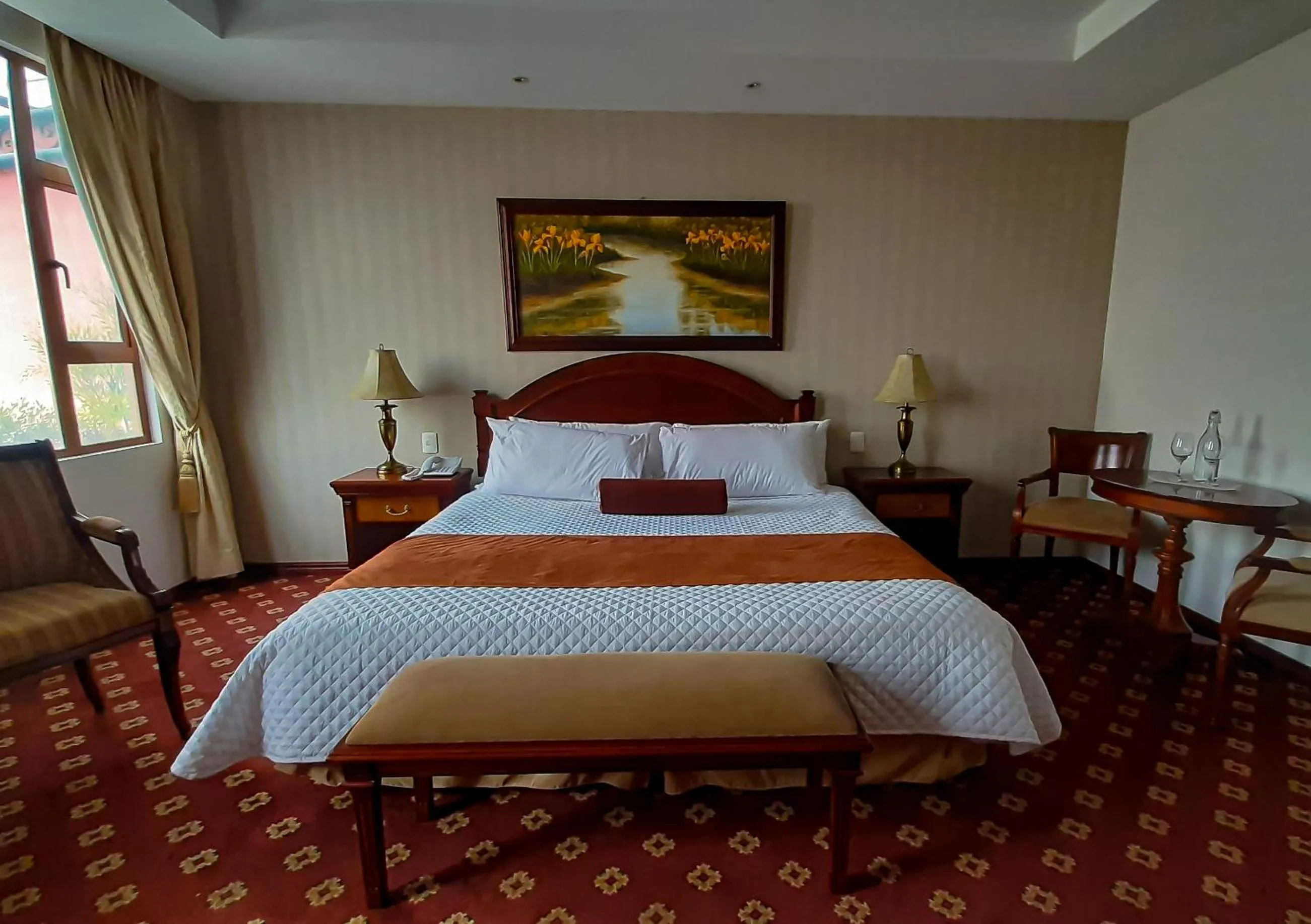Bed in Grand Victoria Boutique Hotel