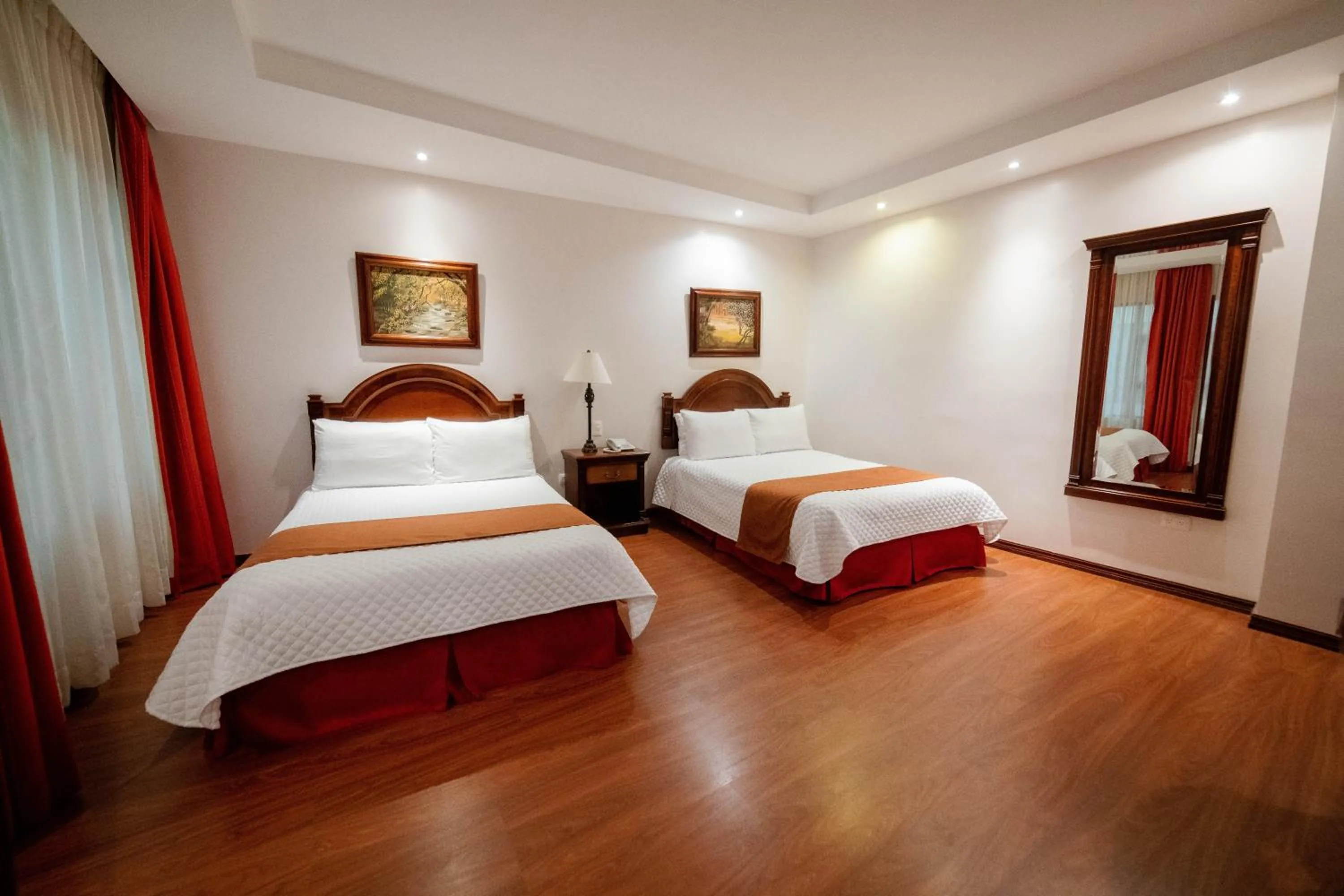 Bed in Grand Victoria Boutique Hotel