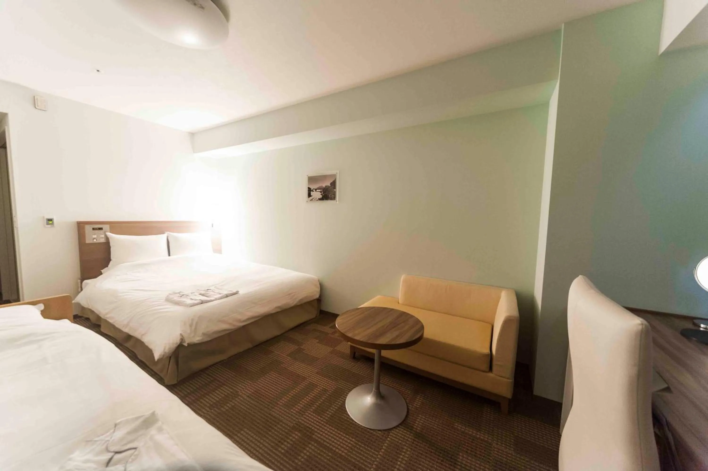 Bed in Daiwa Roynet Hotel Okinawa-Kenchomae