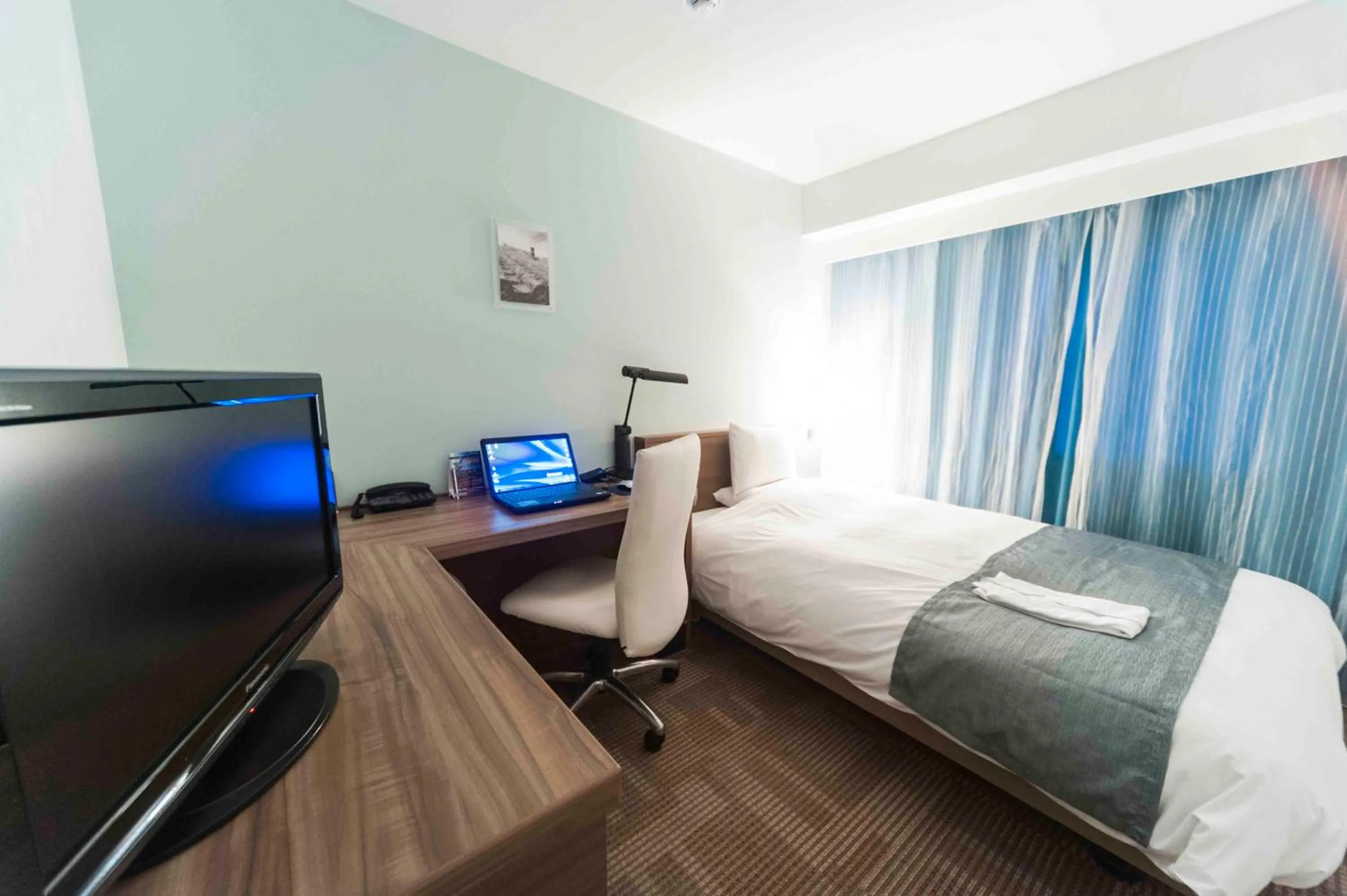 Bed in Daiwa Roynet Hotel Okinawa-Kenchomae