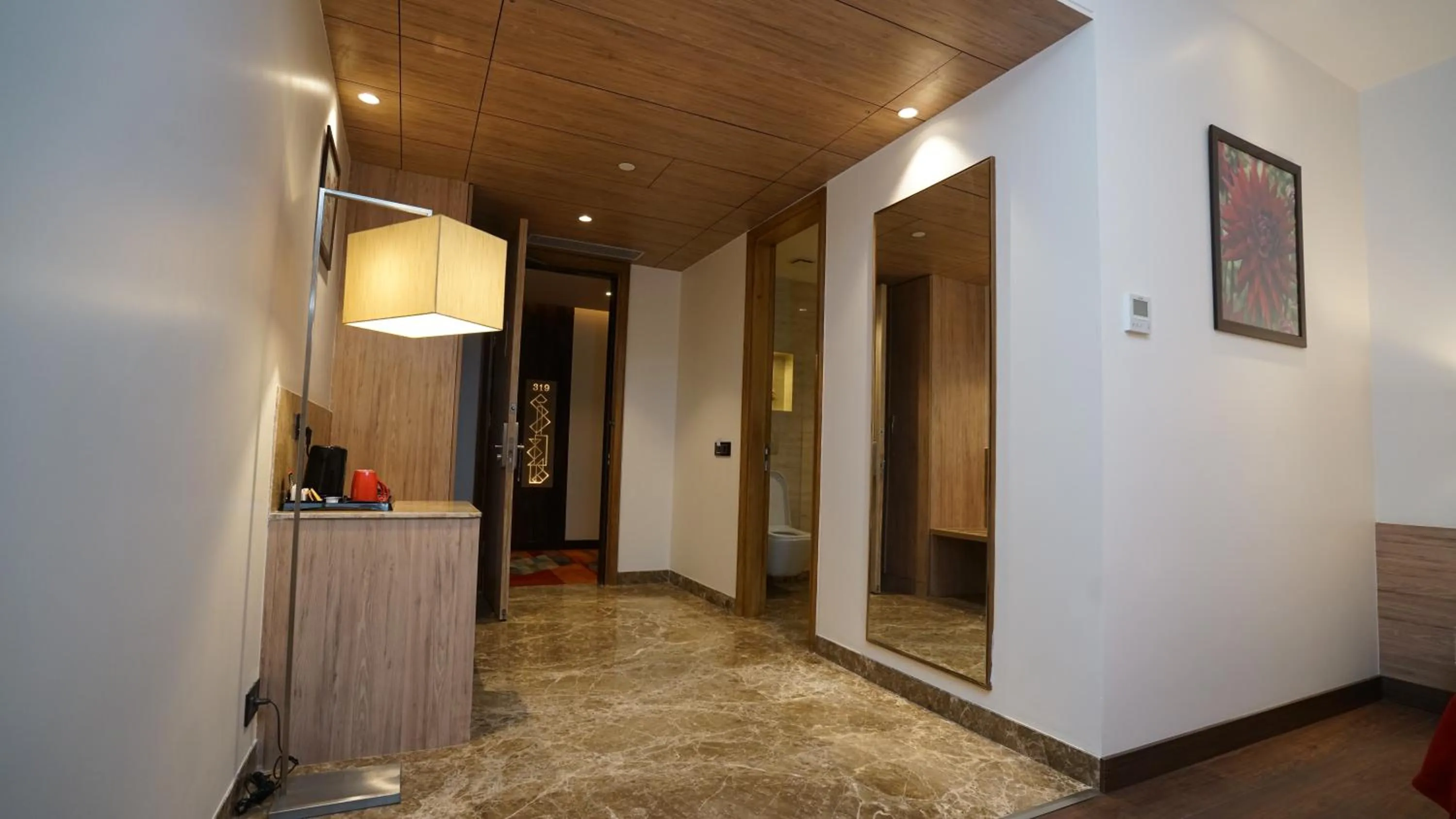 TV and multimedia in Ramada by Wyndham Aligarh GT Road