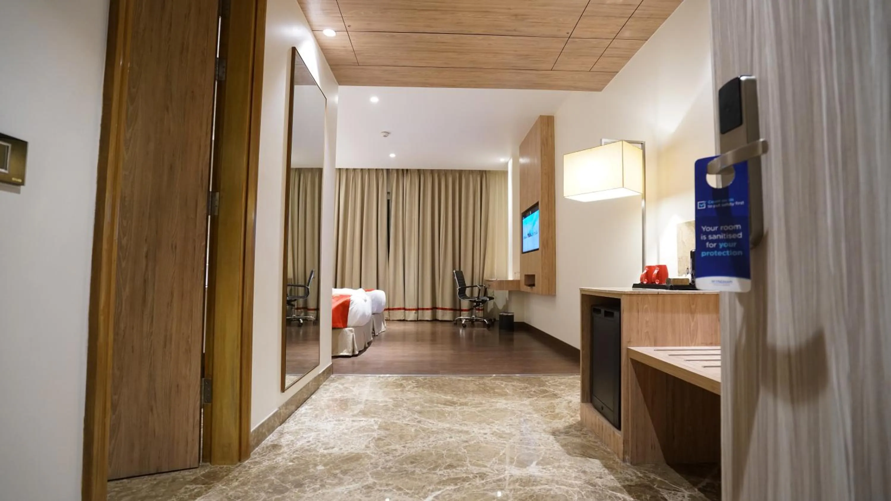 Bedroom in Ramada by Wyndham Aligarh GT Road
