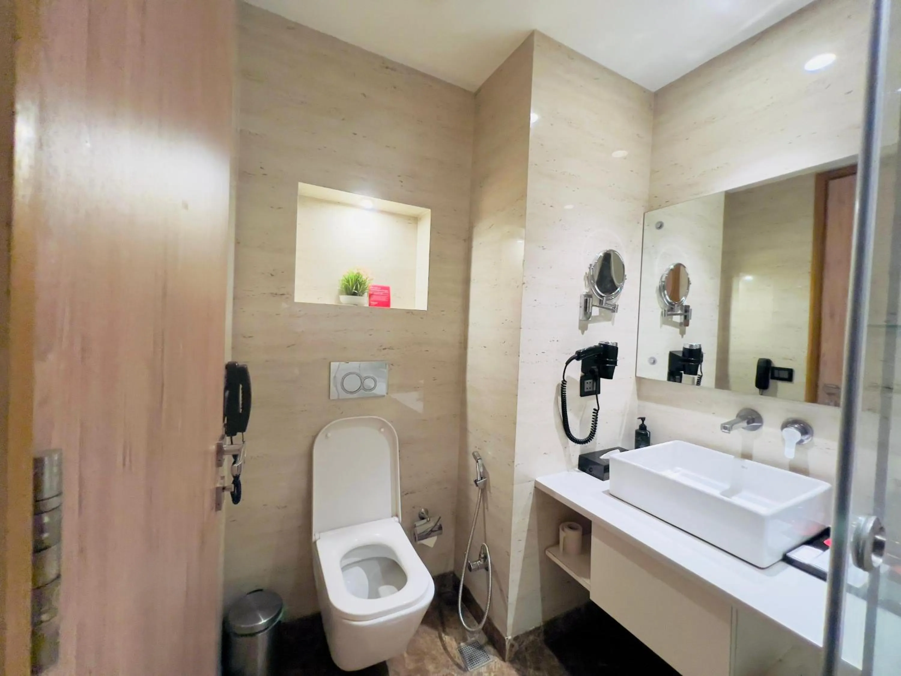 Bathroom in Ramada by Wyndham Aligarh GT Road