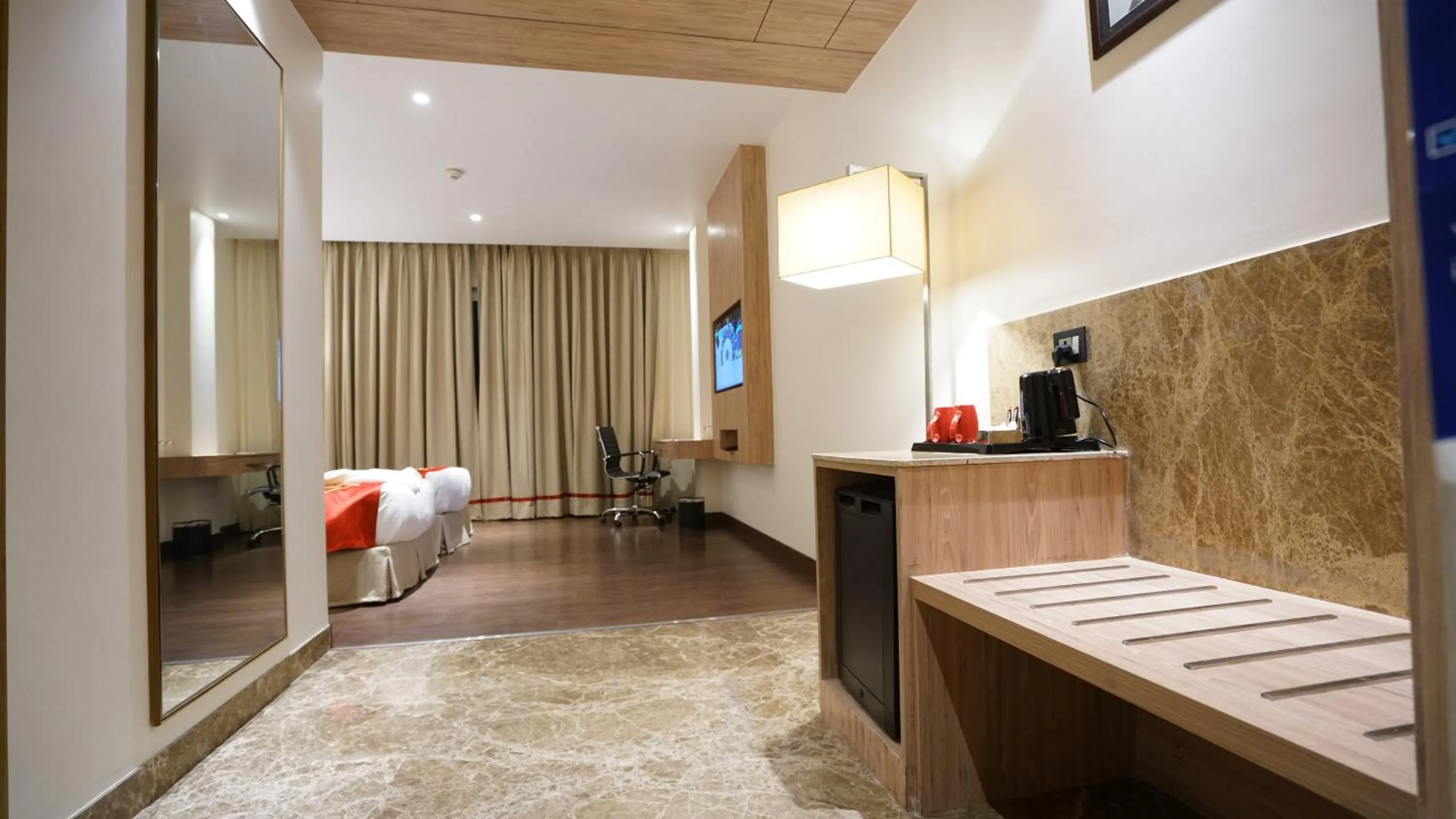 Bedroom in Ramada by Wyndham Aligarh GT Road