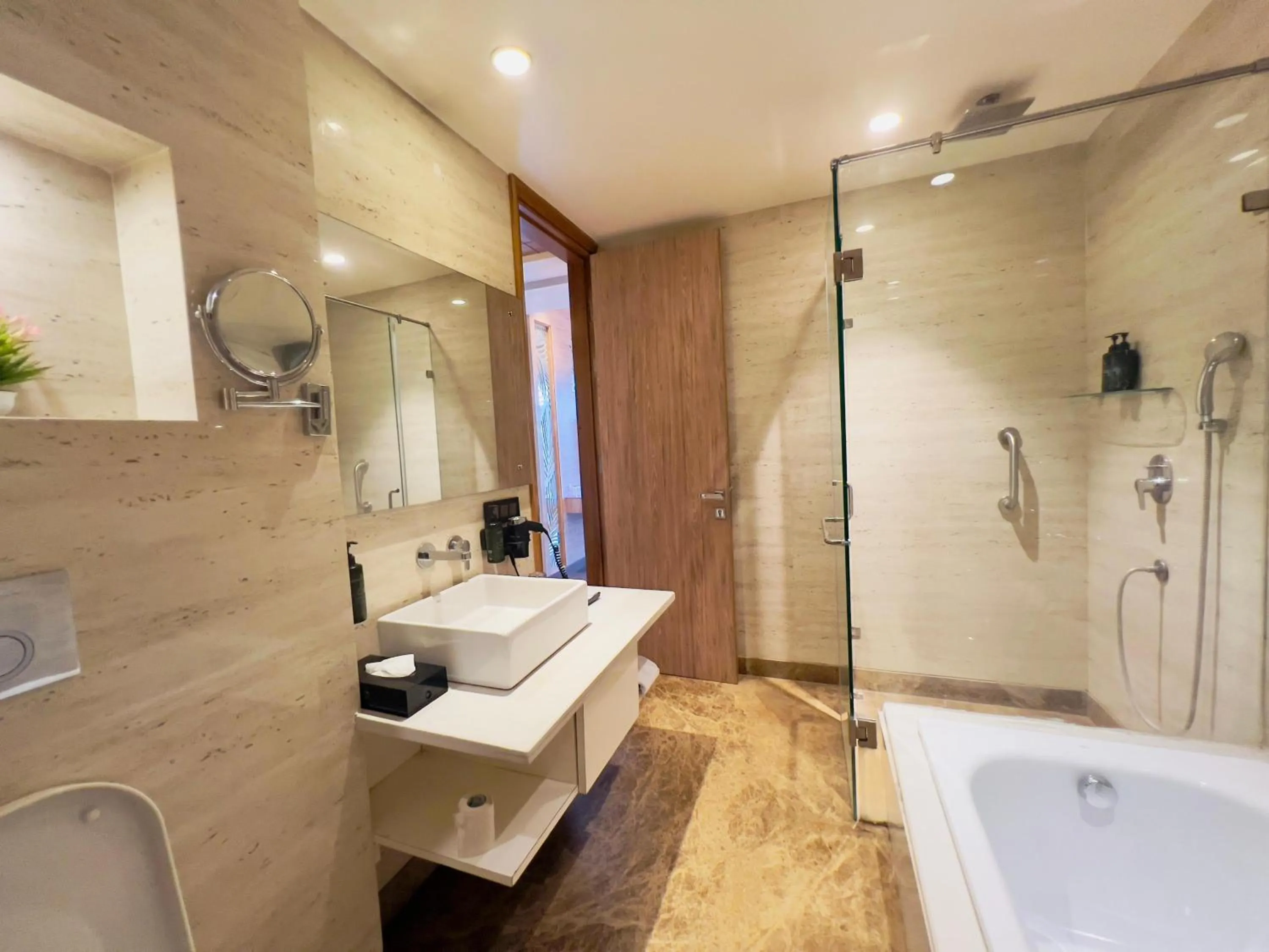 Bathroom in Ramada by Wyndham Aligarh GT Road