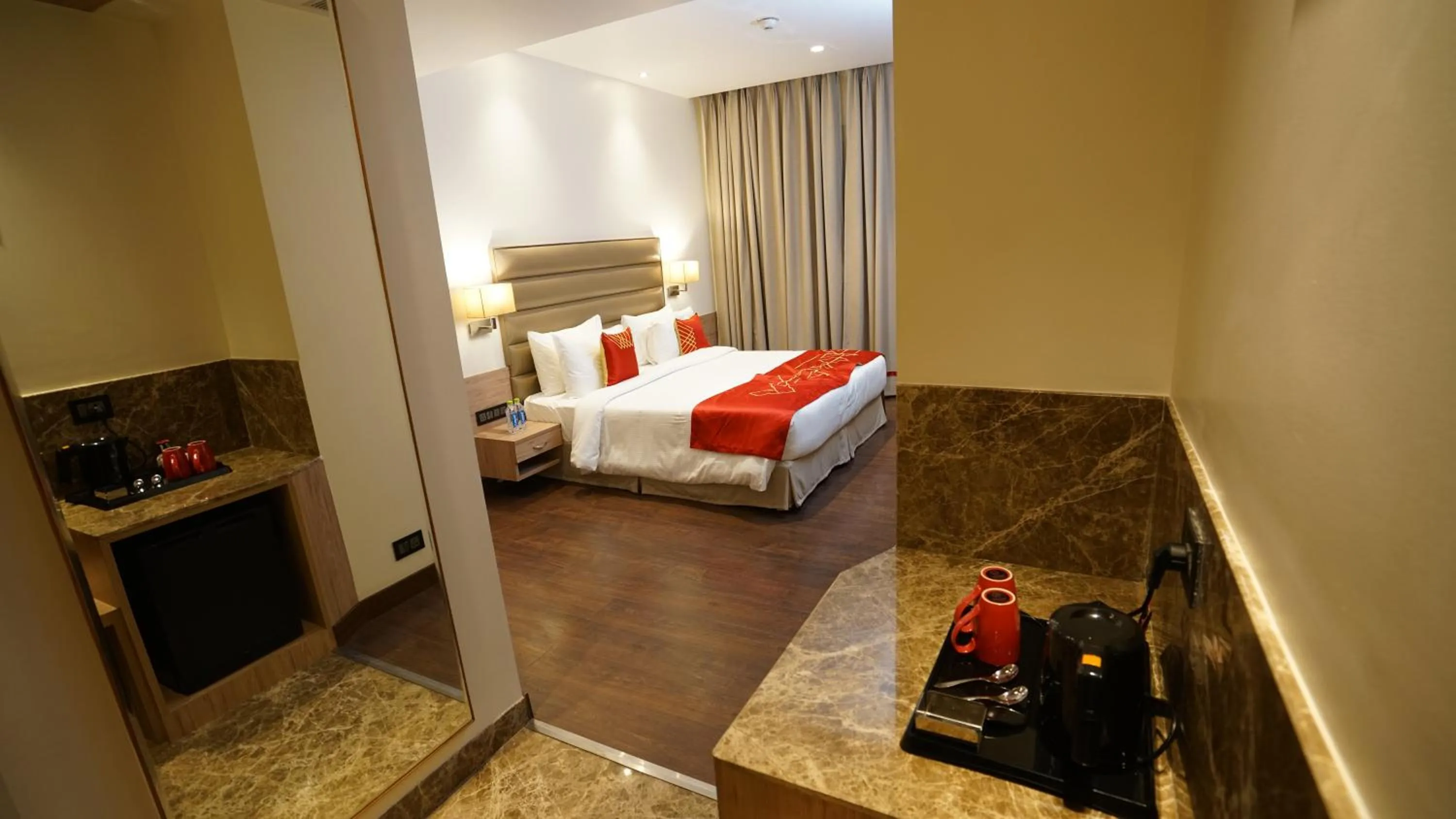 Photo of the whole room, Bed in Ramada by Wyndham Aligarh GT Road