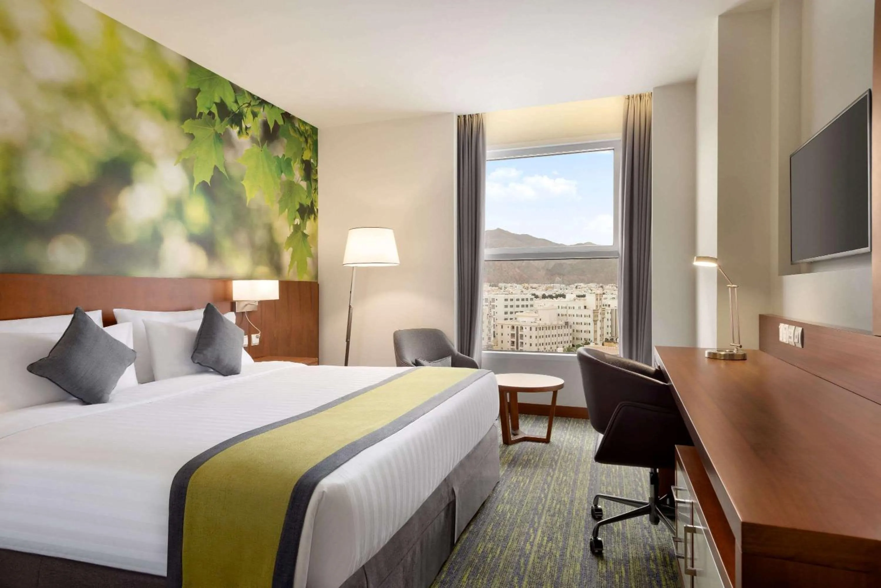 Photo of the whole room, Bed in Wyndham Garden Muscat Al Khuwair