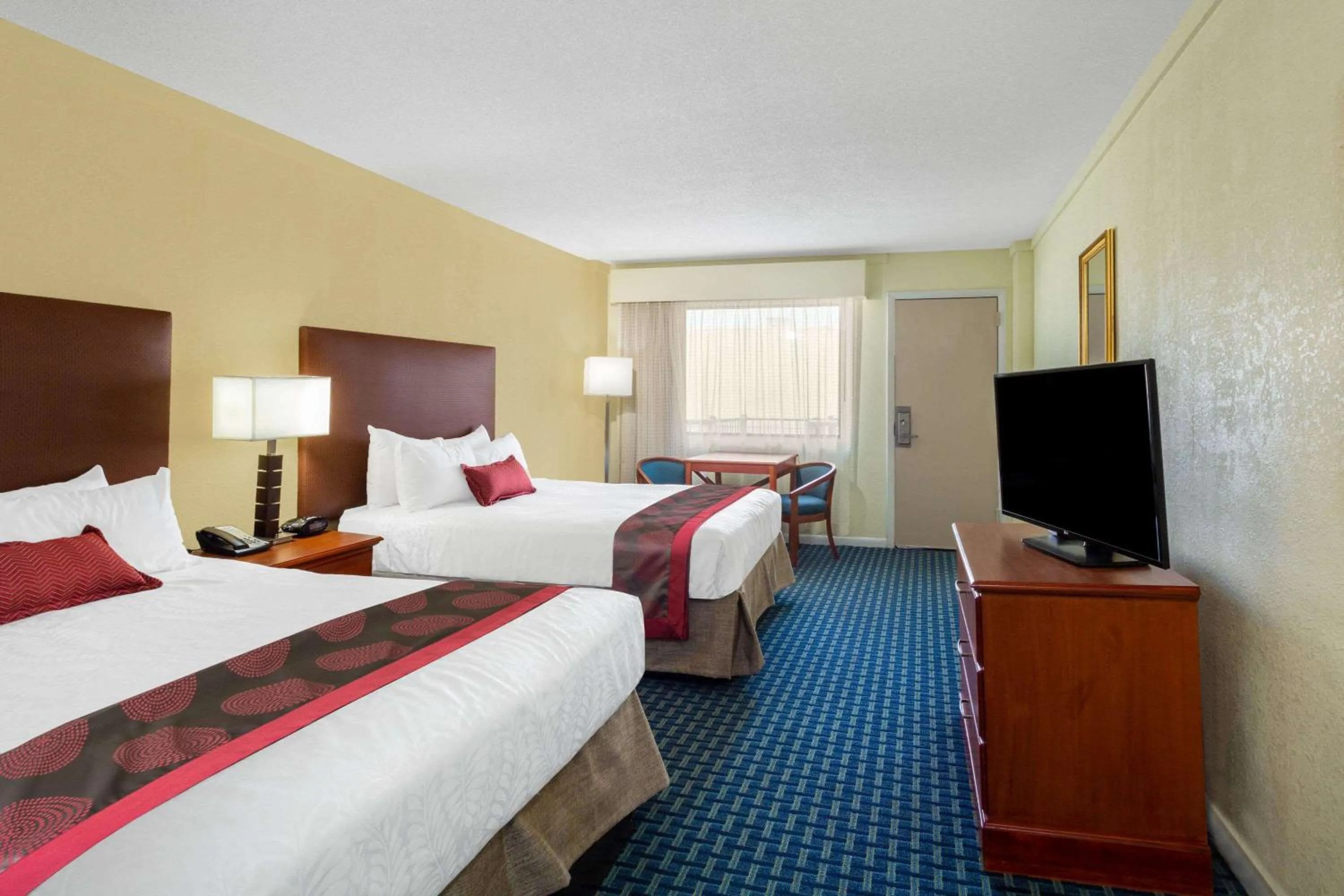 Photo of the whole room, Bed in Ramada by Wyndham Virginia Beach