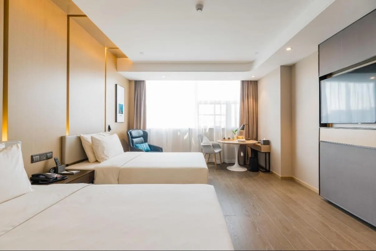 Bed in Atour Hotel Nanjing Olympic Center