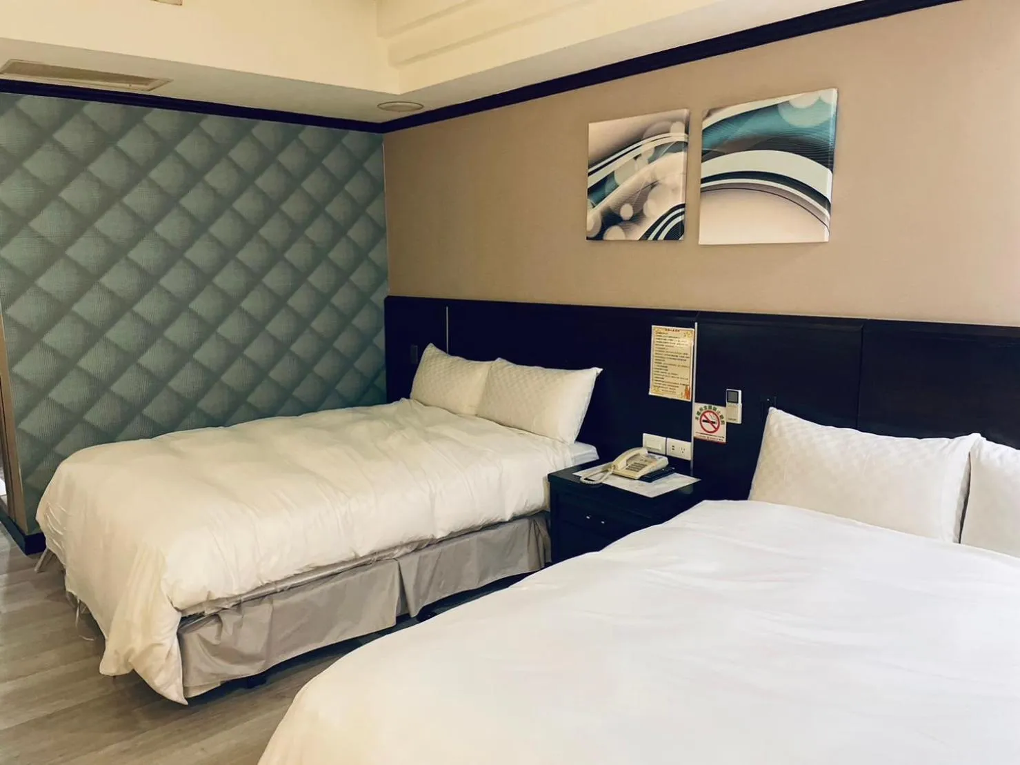 Bed in Felicity Business Hotel