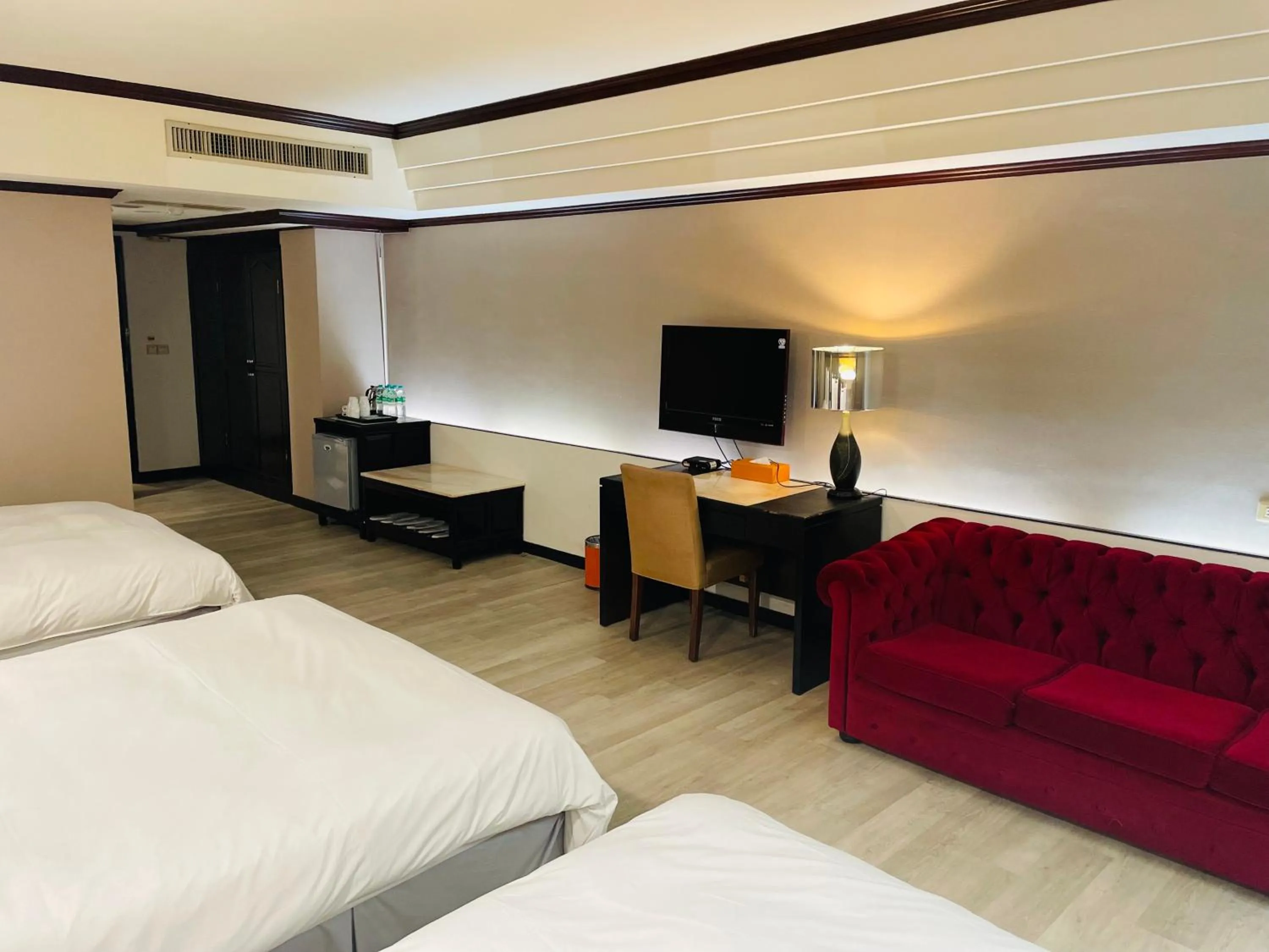 Bed in Felicity Business Hotel