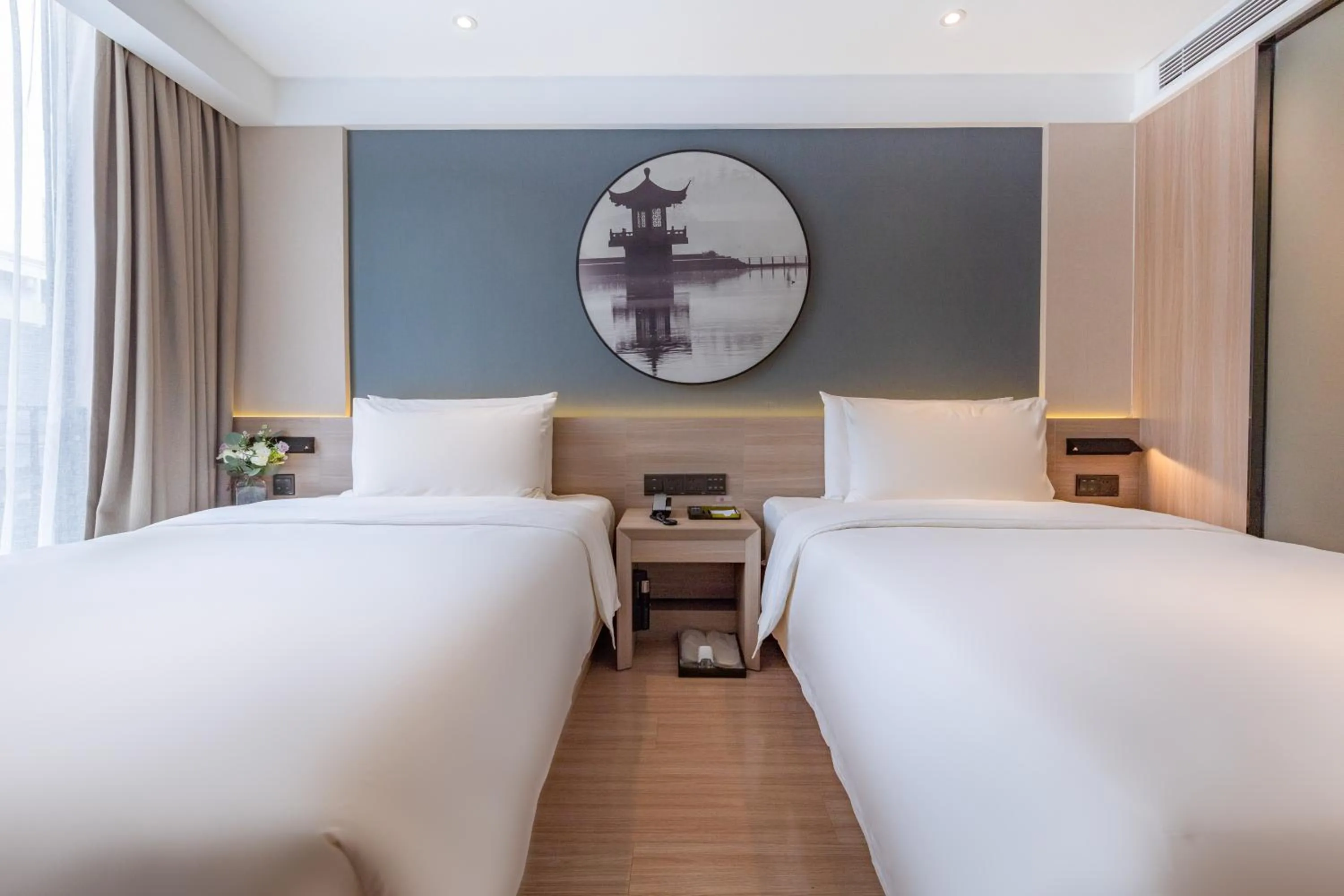 Bed in Atour Light Hotel (Chengdu Hi-tech West Zone University of Electronic Technology)