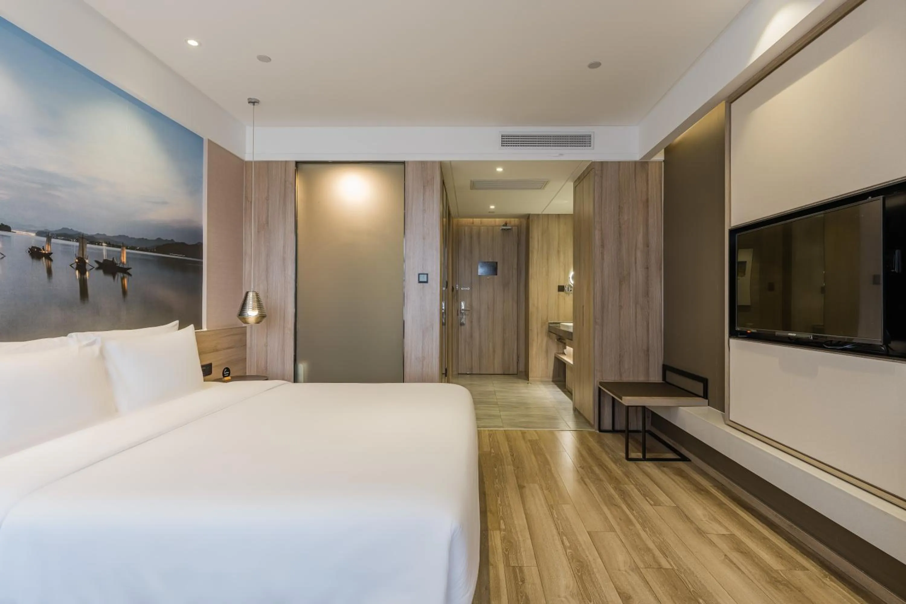 Photo of the whole room, Bed in Atour Hotel Hangzhou Binjiang Jiangling Road