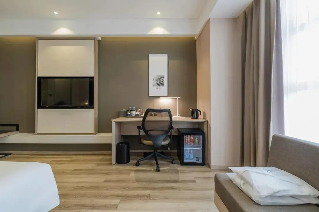 Bed in Atour Hotel Hangzhou Binjiang Jiangling Road