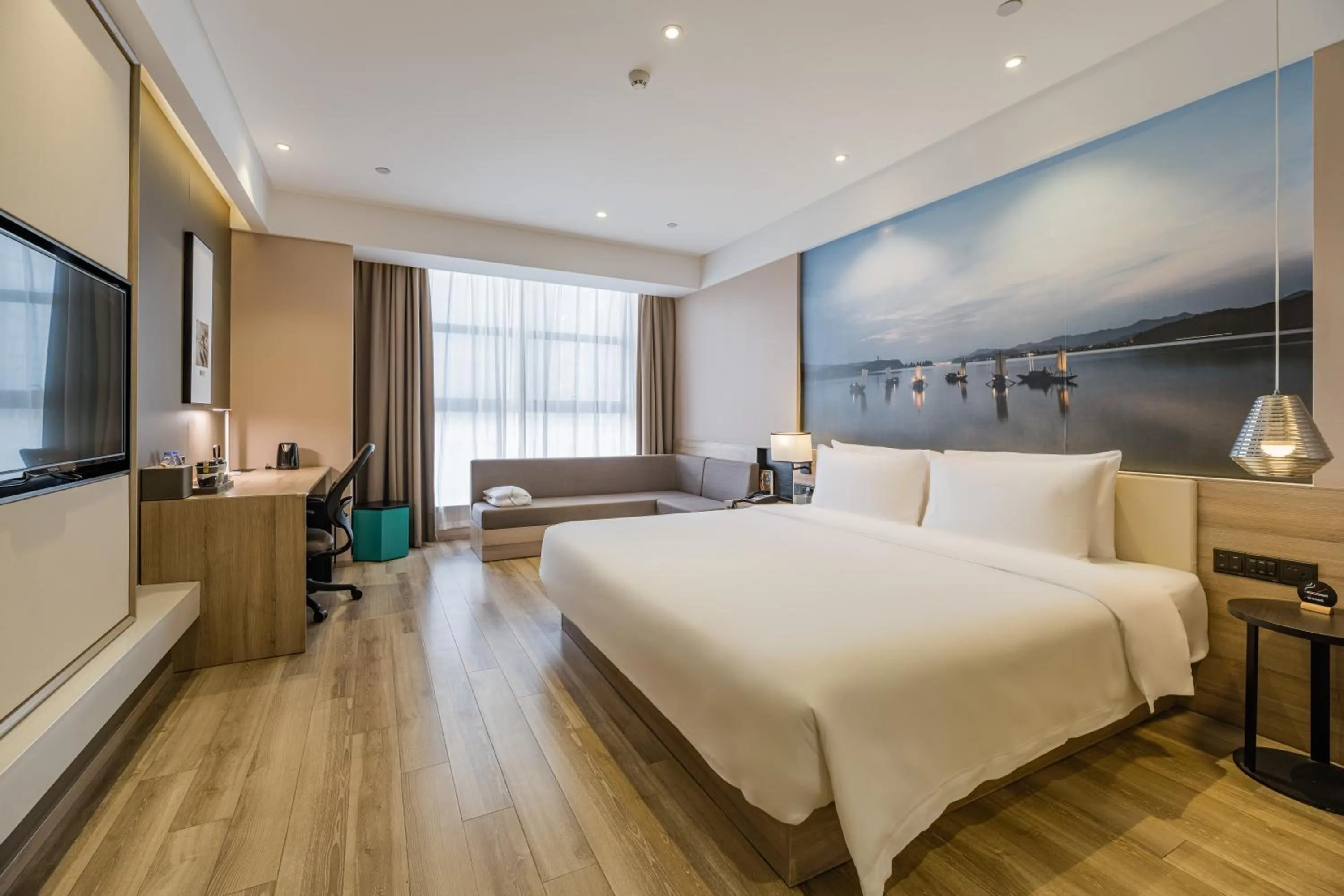 Photo of the whole room, Bed in Atour Hotel Hangzhou Binjiang Jiangling Road