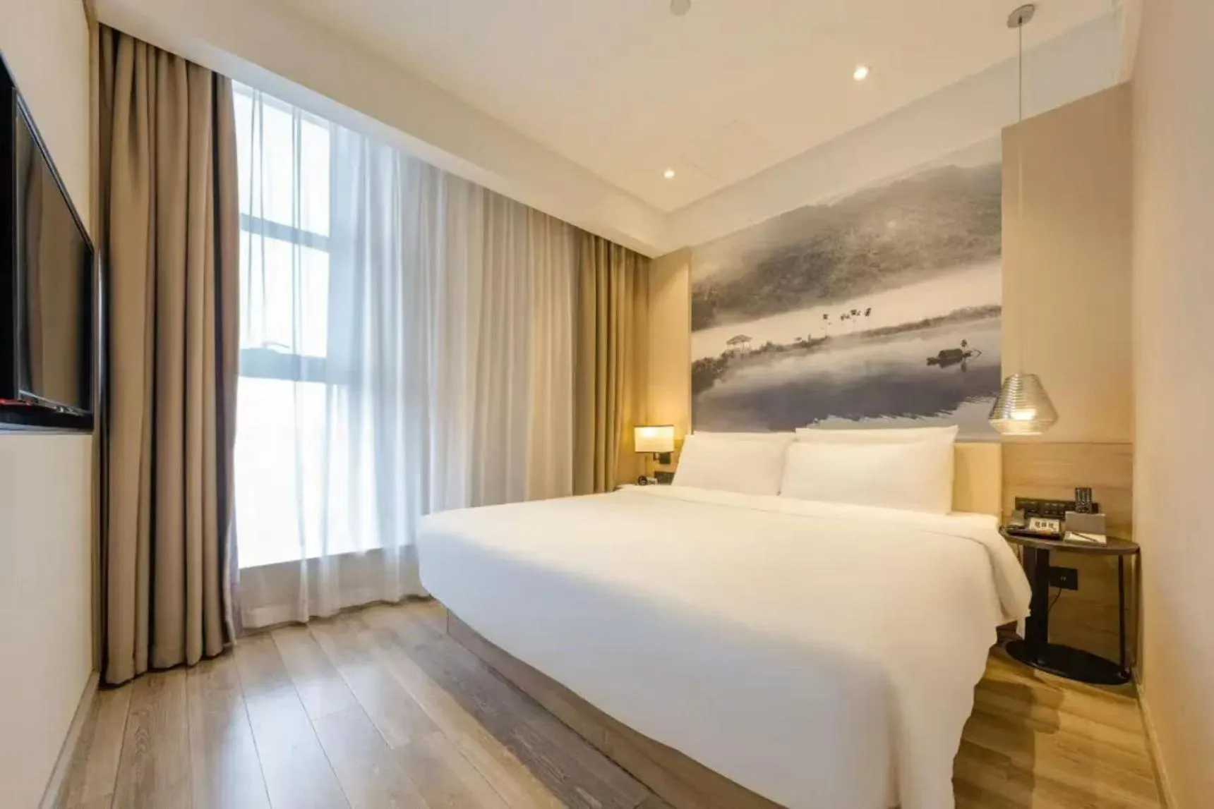 Bed in Atour Hotel Hangzhou Binjiang Jiangling Road