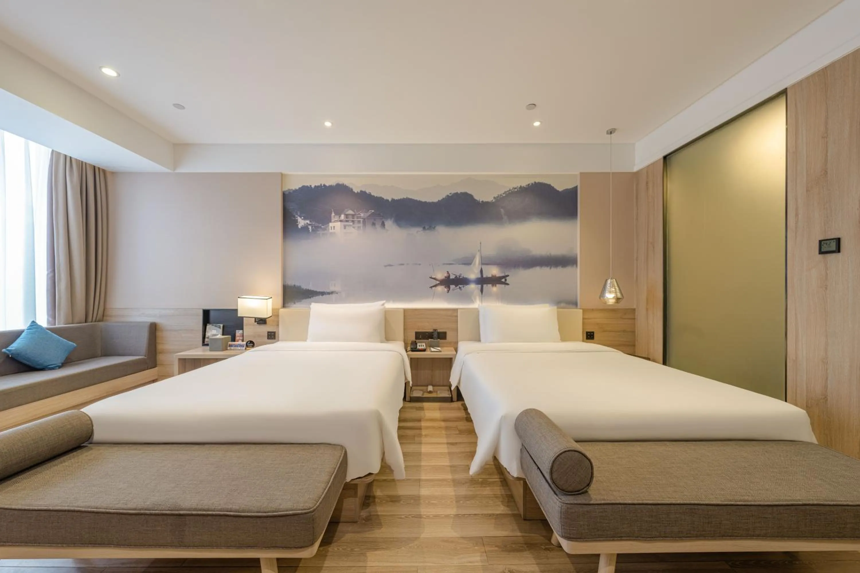 Photo of the whole room, Bed in Atour Hotel Hangzhou Binjiang Jiangling Road