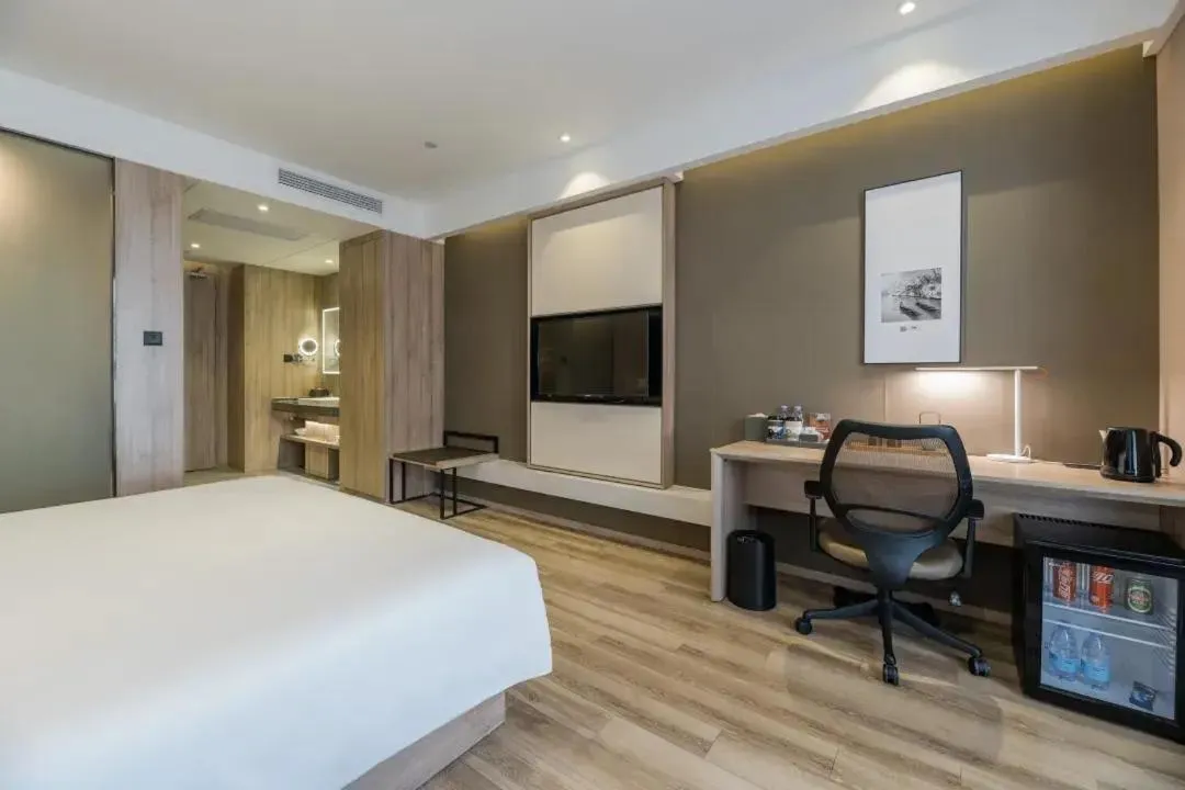 Bed in Atour Hotel Hangzhou Binjiang Jiangling Road