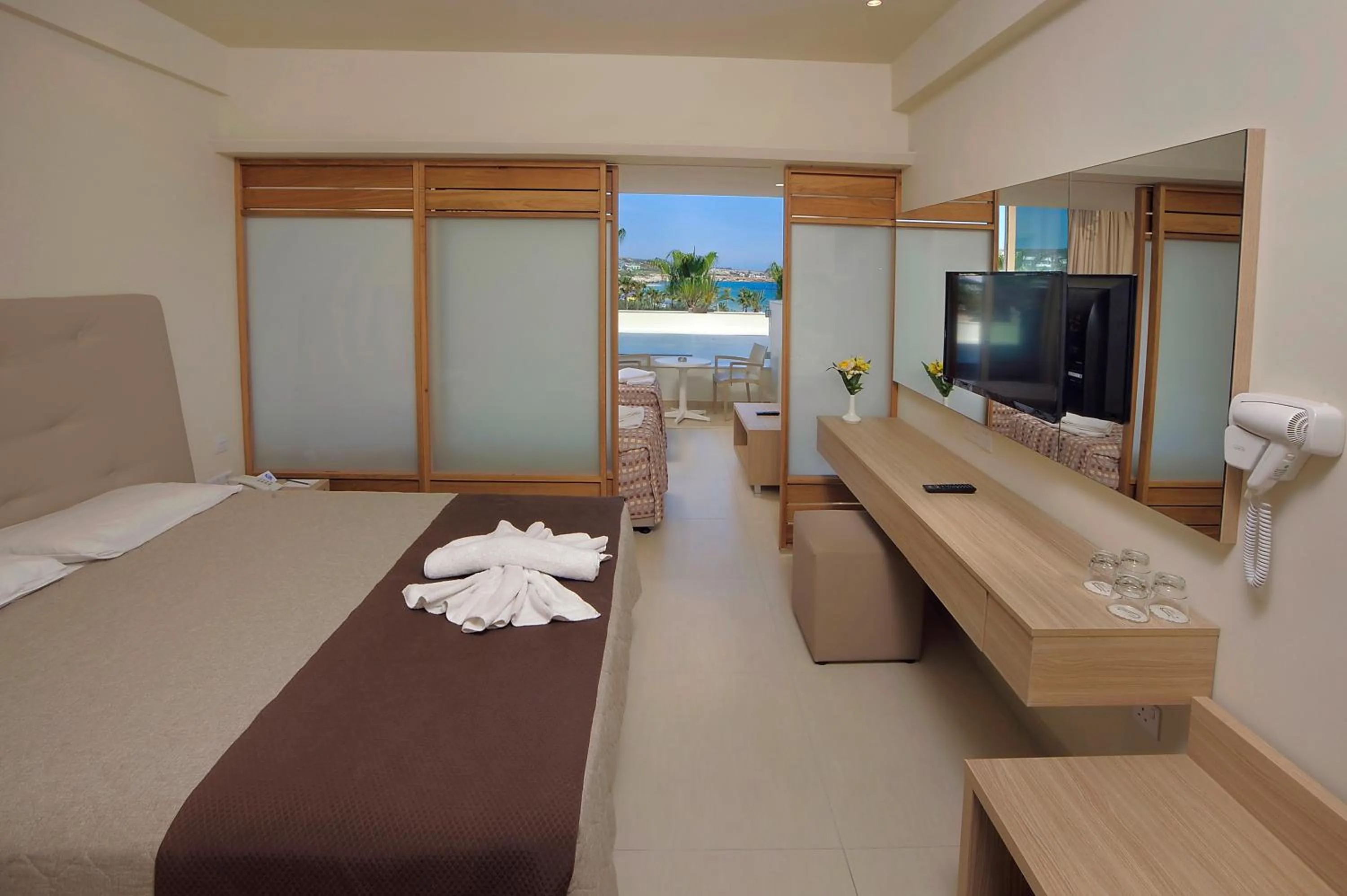 Bed in Nelia Beach Hotel & Spa