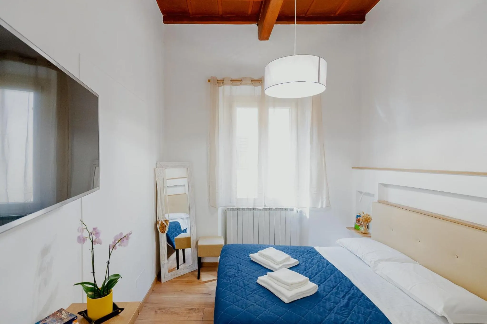 Bed in Florence Rooms